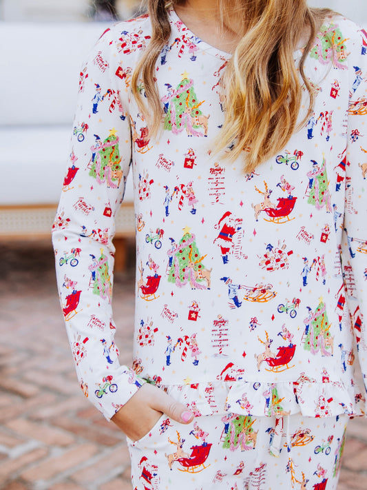 Up close picture of north pole print on ruffled top