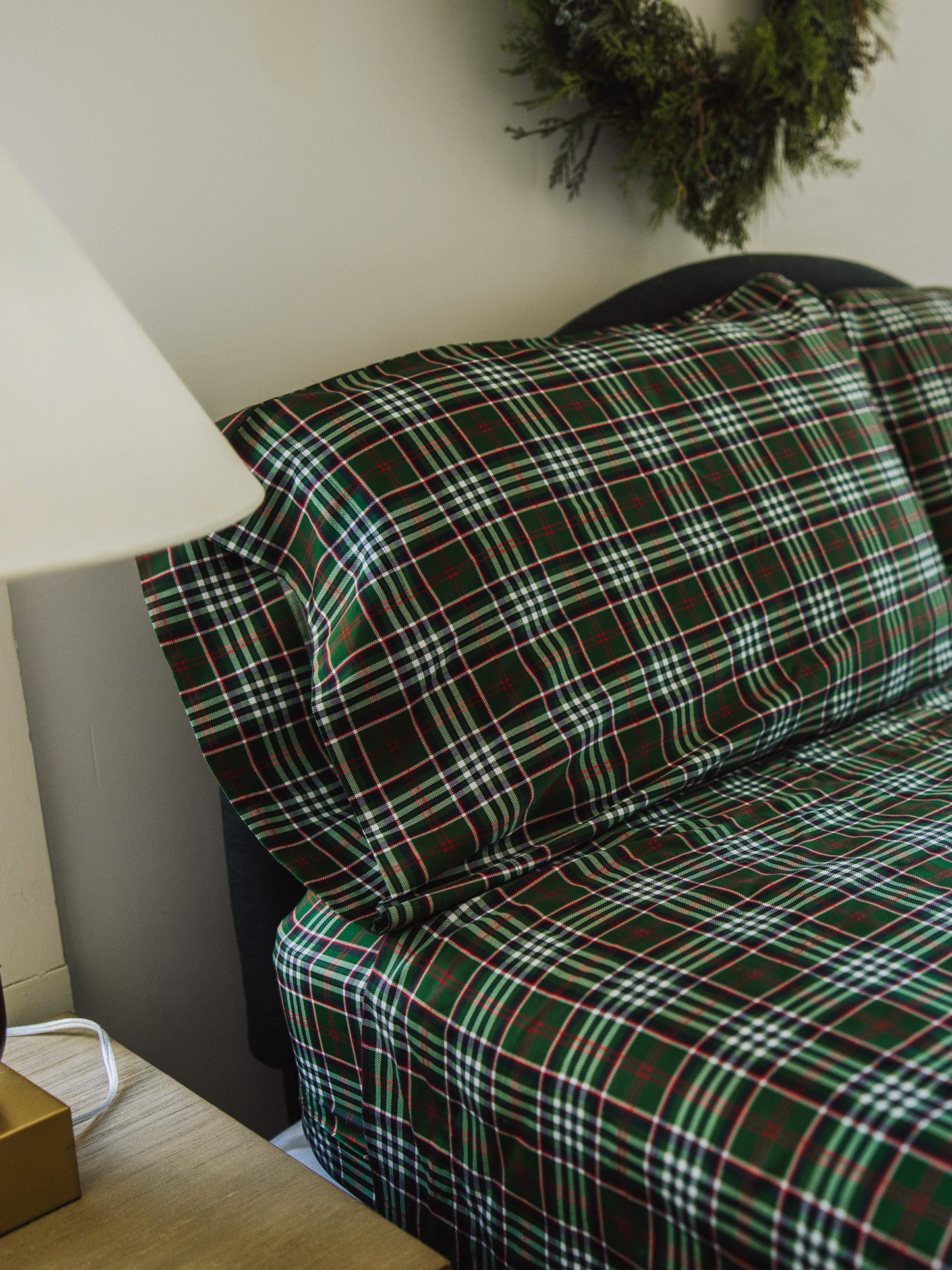 Green plaid pillow cases and sheet.