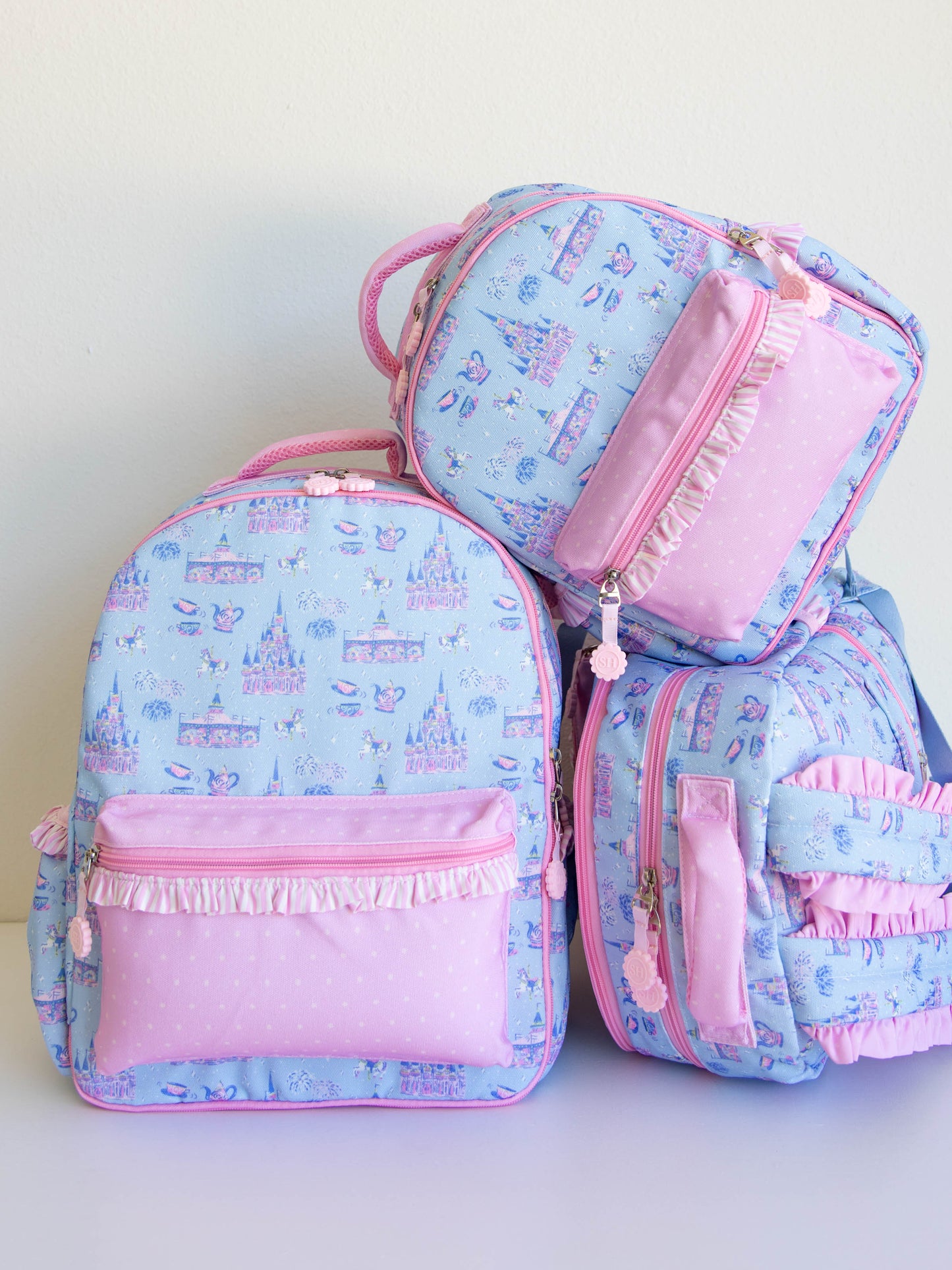 Bring the magic wherever you go with SweetHoney's Most Magical Backpack — a whimsical essential for school days, travel adventures, and every little outing in between! Designed in our signature Most Magical print, this backpack features charming pastel castles, carriages, and fairytale-inspired details that spark imagination and joy. Crafted from durable, easy-to-clean material, it’s built to last through every adventure.