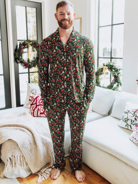This cozy pajama set features an array of sleighs, Christmas trees, reindeer and more. Perfect for the holidays, this Mystic Forest print brings festive charm and timeless style. Made from a soft, brushed fabric, these holiday plaid pajamas are ideal for cozy mornings, matching family photos, or relaxing by the fire. This family matching Christmas pajama set offers both comfort and classic holiday style you’ll love all season long.