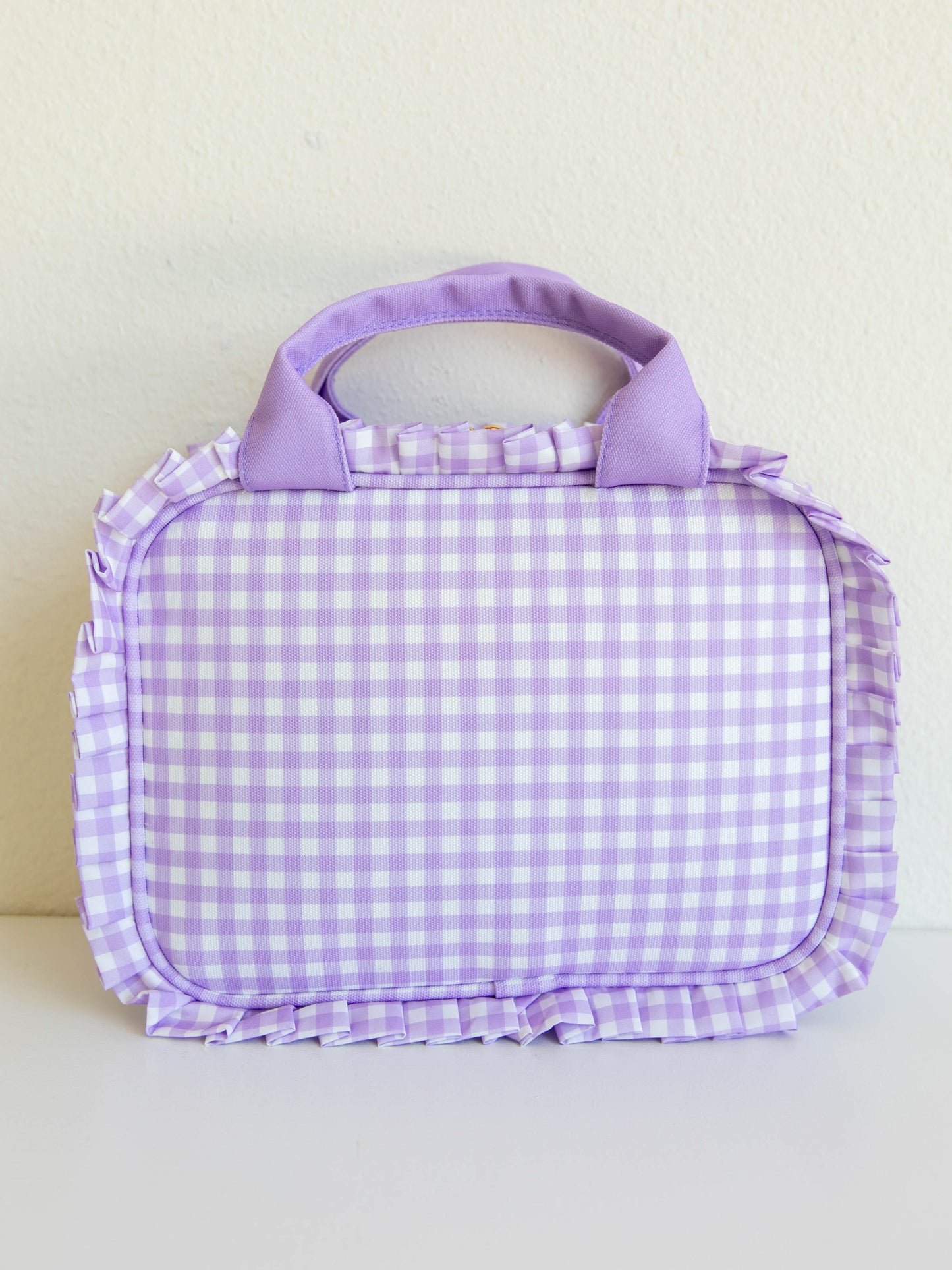 Purple check lunch kit with purple handles and ruffled edge details.