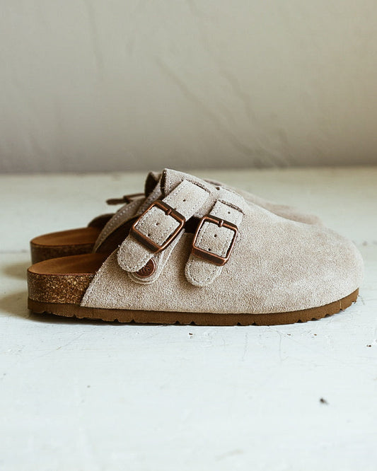 Pair of brown, suede, clog style slip-ons with double buckles.