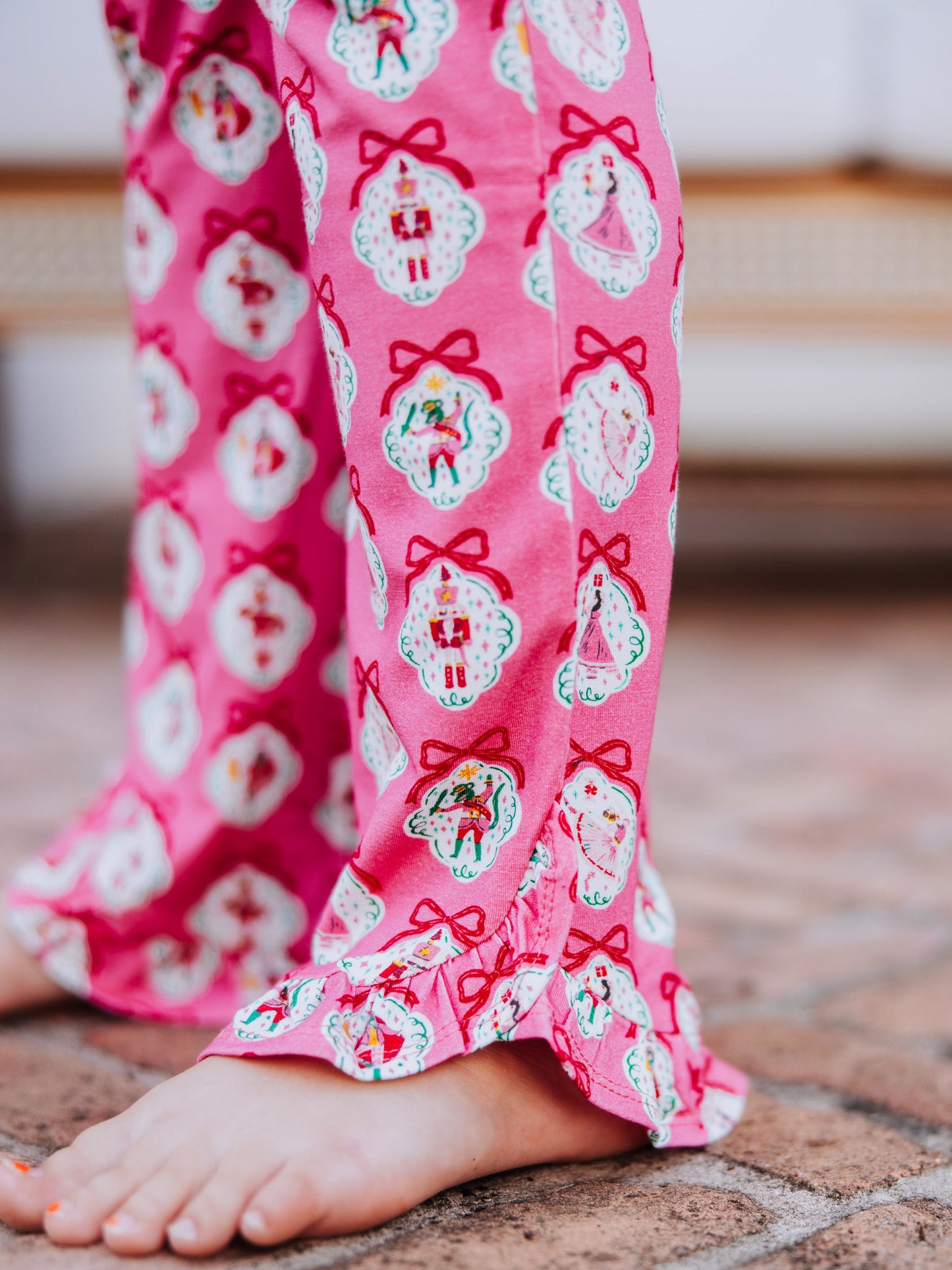 Up close picture of the ruffles at bottom of pant leg. 