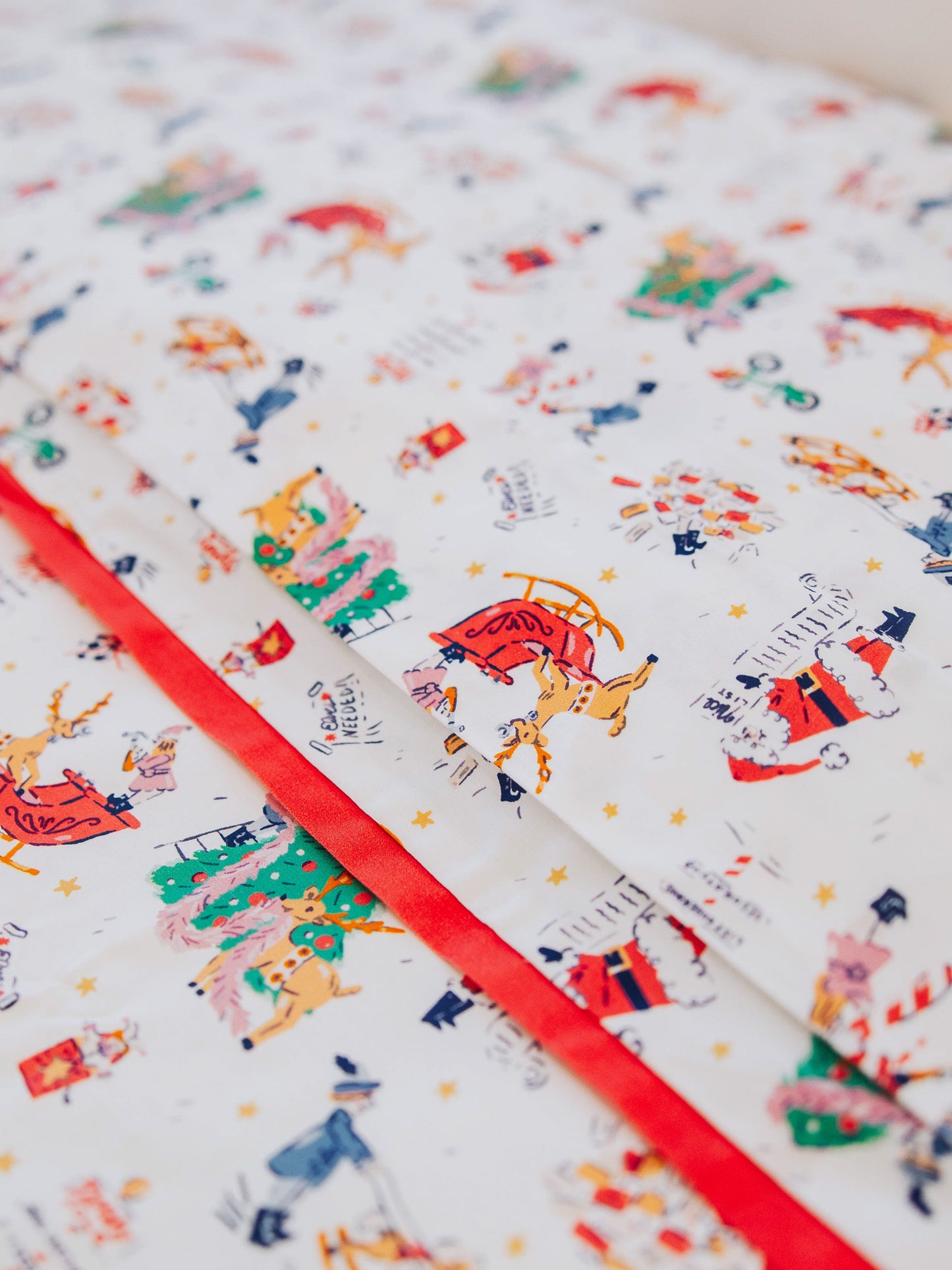 Up close picture of North Pole themed sheets and duvet
