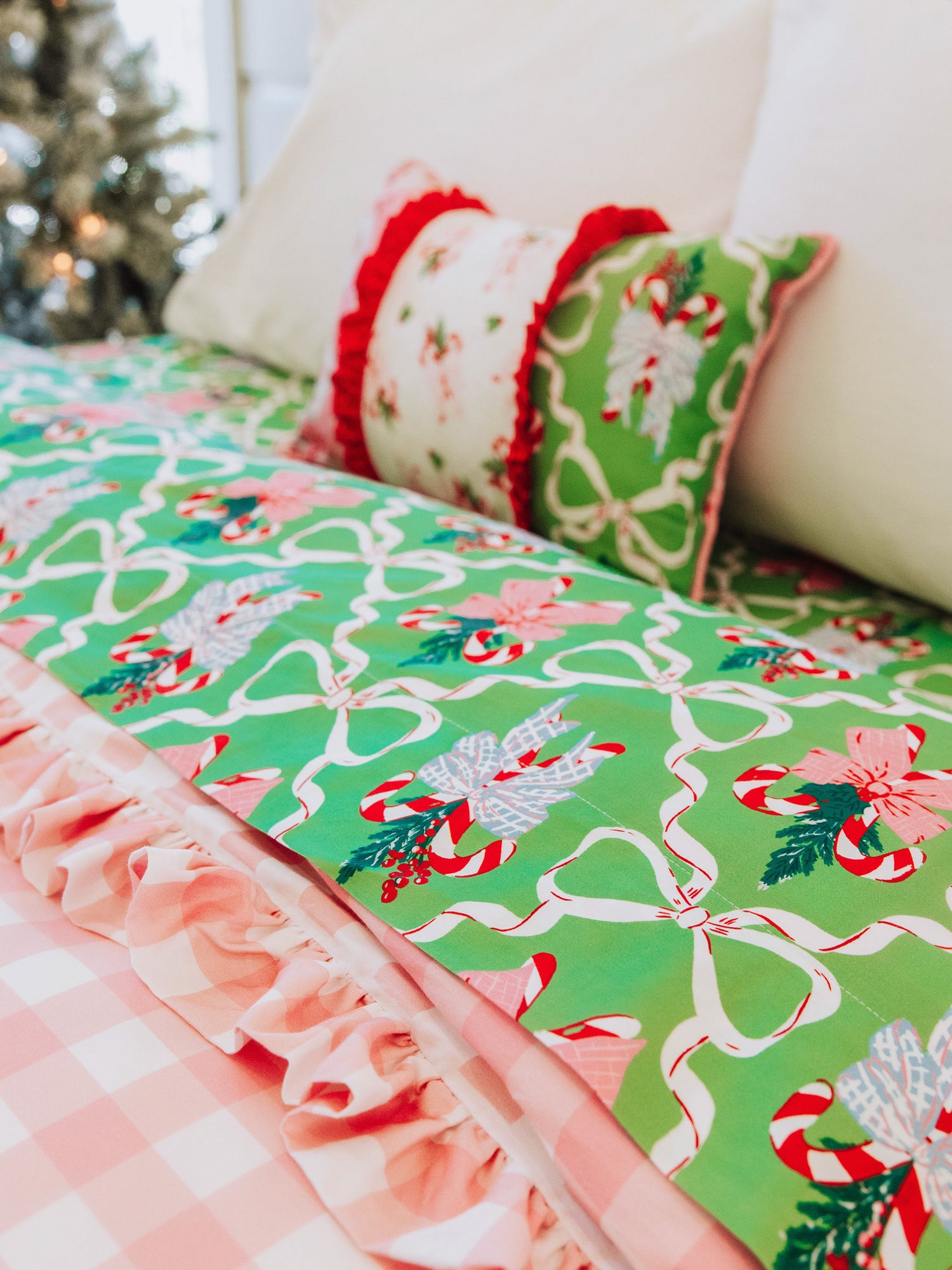 Holiday themed boudoir pillow with matching bedding all around. 
