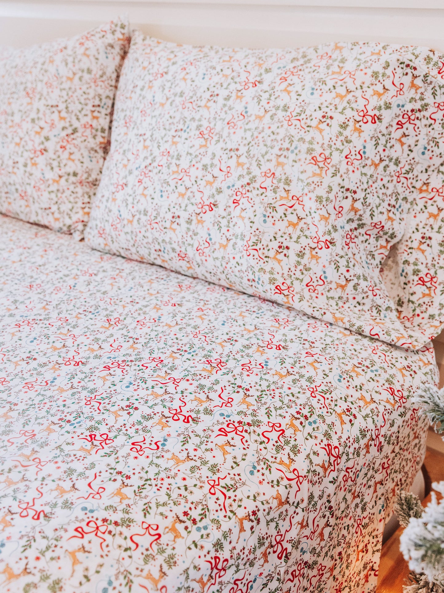 Holiday themed sheet set and matching pillow cases. 