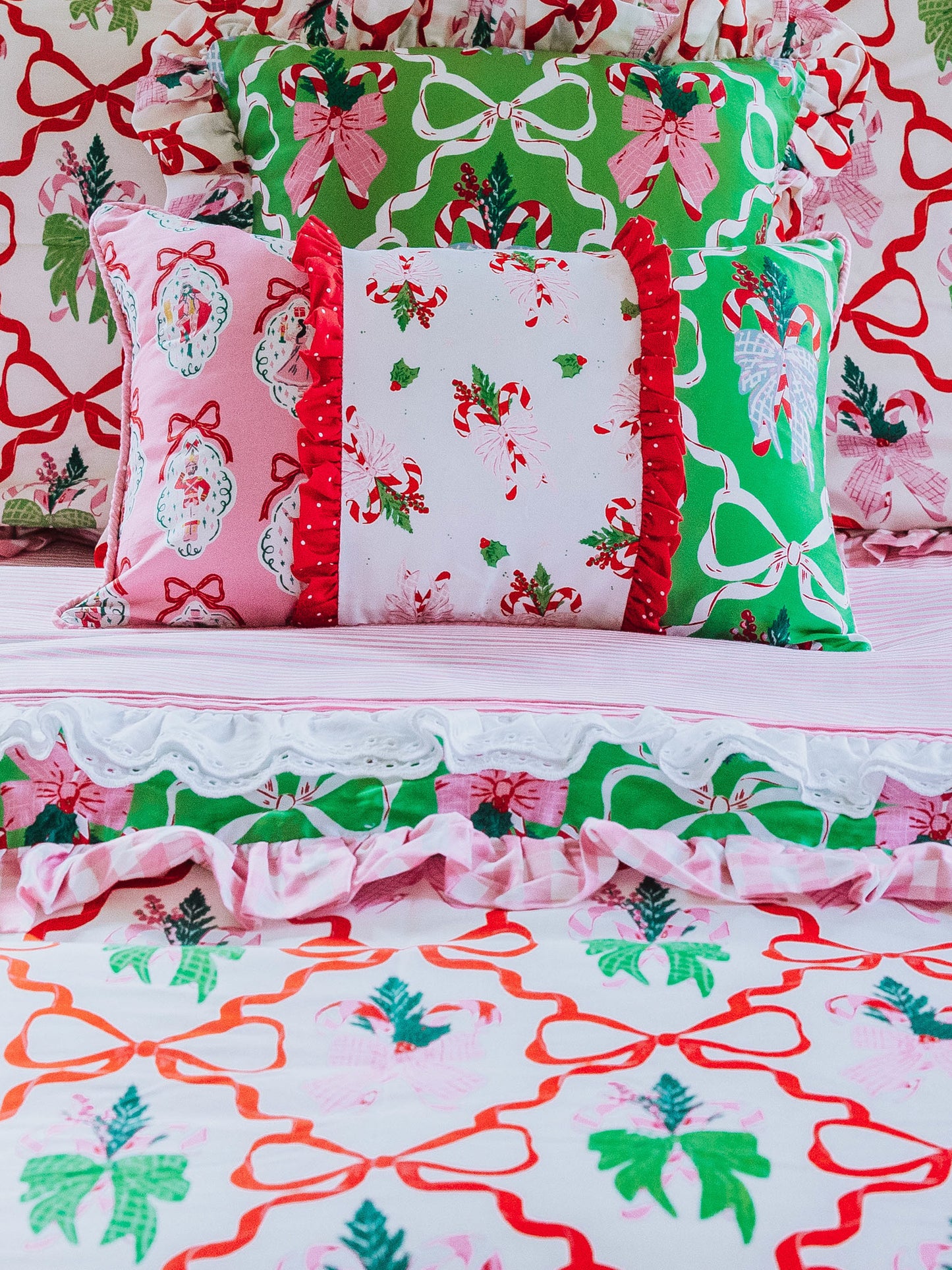 Holiday themed boudoir pillow with matching bedding all around. 