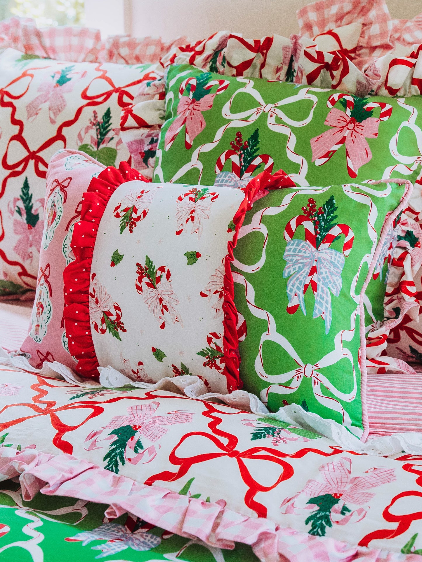 Holiday themed boudoir pillow with matching bedding all around. 