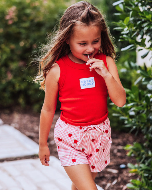 Red sleeveless tank top with SweetHoney logo on chest