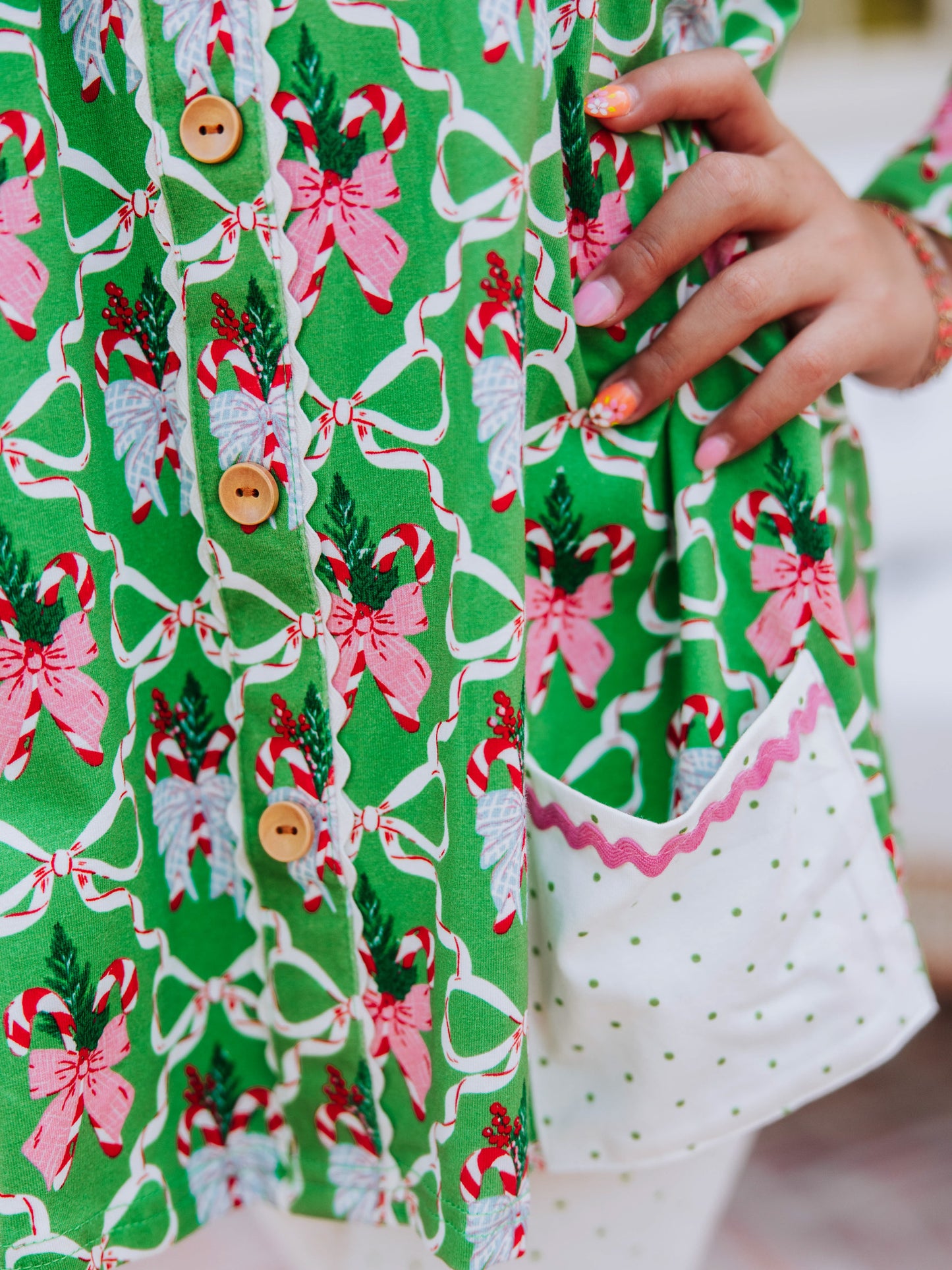 Close up of green holiday bow print. 
