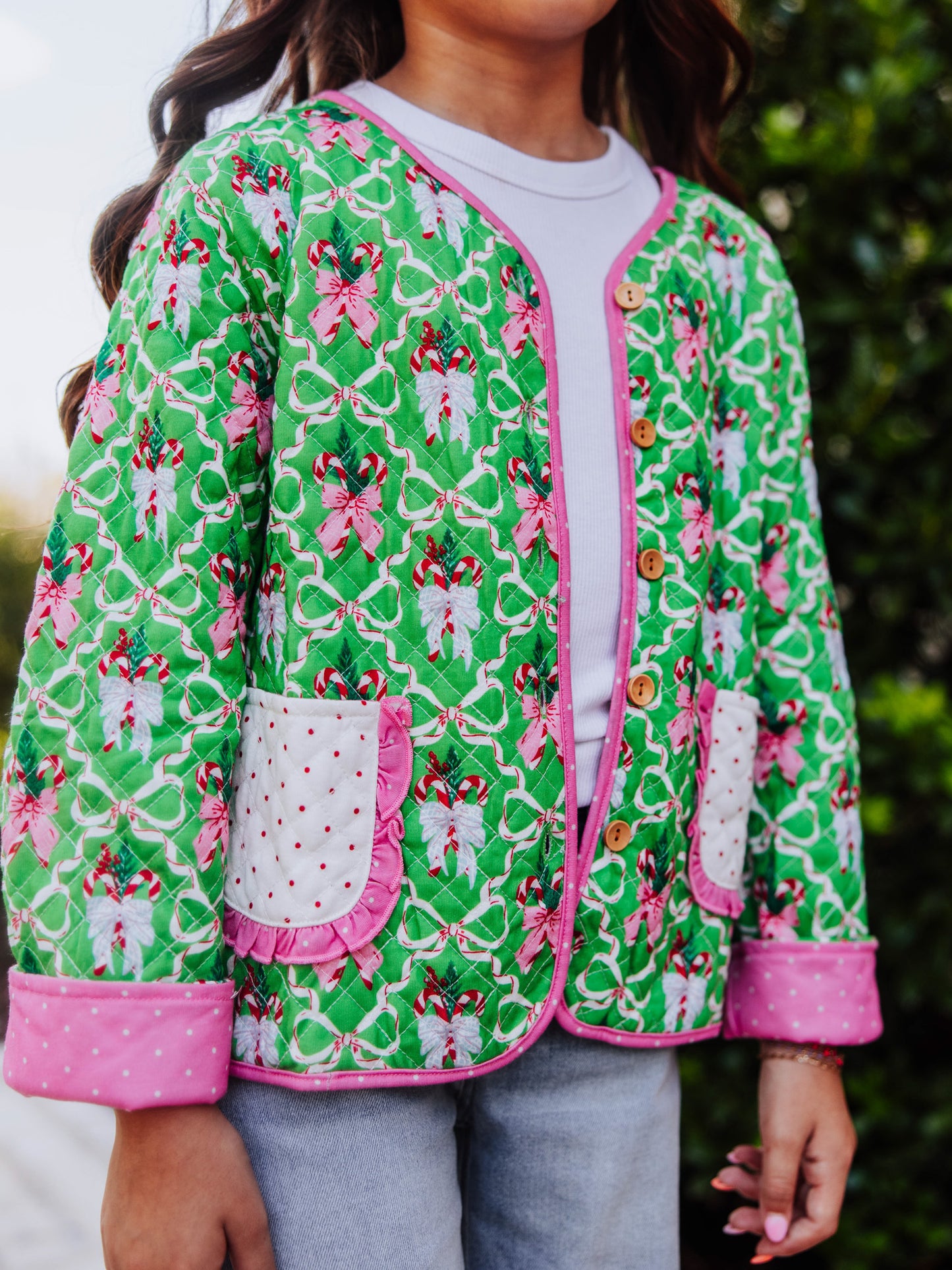 Holiday themed quilted cardigan.