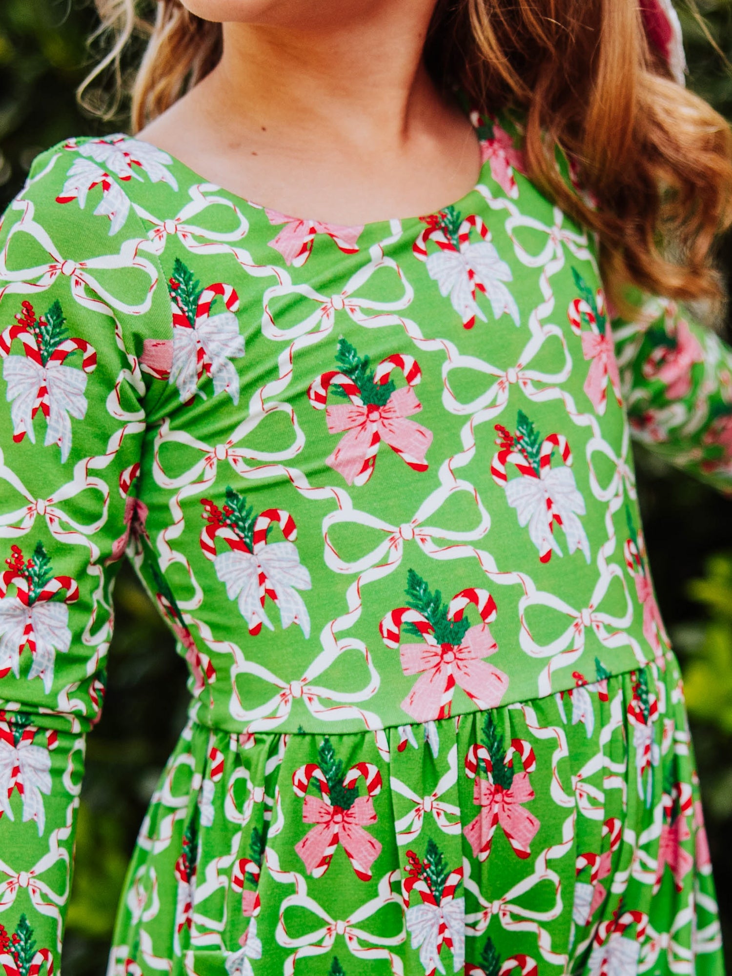 Up close shot of a green bow holiday print