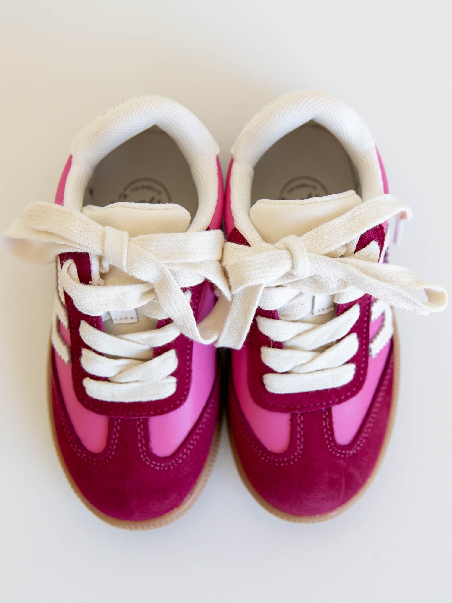 Step into style with our SweetHoney Signature Sneakers! Designed for comfort and play, these adorable girls’ sneakers feature a fun mix of pink and magenta tones with our signature “SH” SweetHoney logo for a bold, playful touch. Crafted with soft materials, sturdy soles, and easy lace-up styling, they’re perfect for school days, adventures, and everyday wear. Combining fashion and function, these sneakers are a must-have for every little trendsetter!