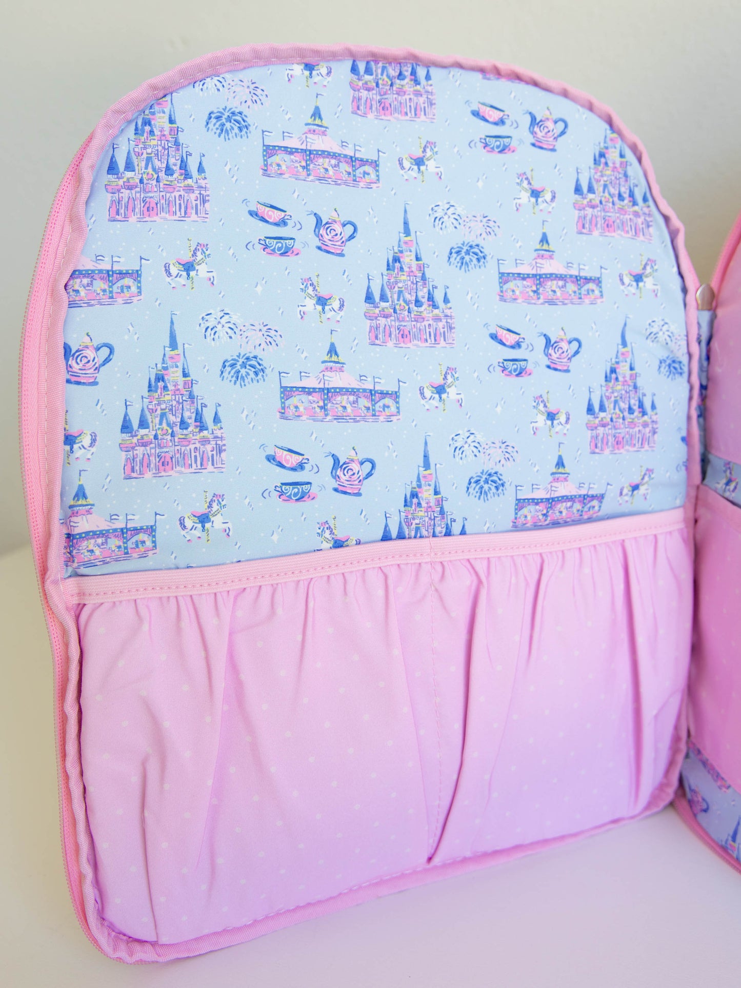 Bring the magic wherever you go with SweetHoney's Most Magical Backpack — a whimsical essential for school days, travel adventures, and every little outing in between! Designed in our signature Most Magical print, this backpack features charming pastel castles, carriages, and fairytale-inspired details that spark imagination and joy. Crafted from durable, easy-to-clean material, it’s built to last through every adventure. 