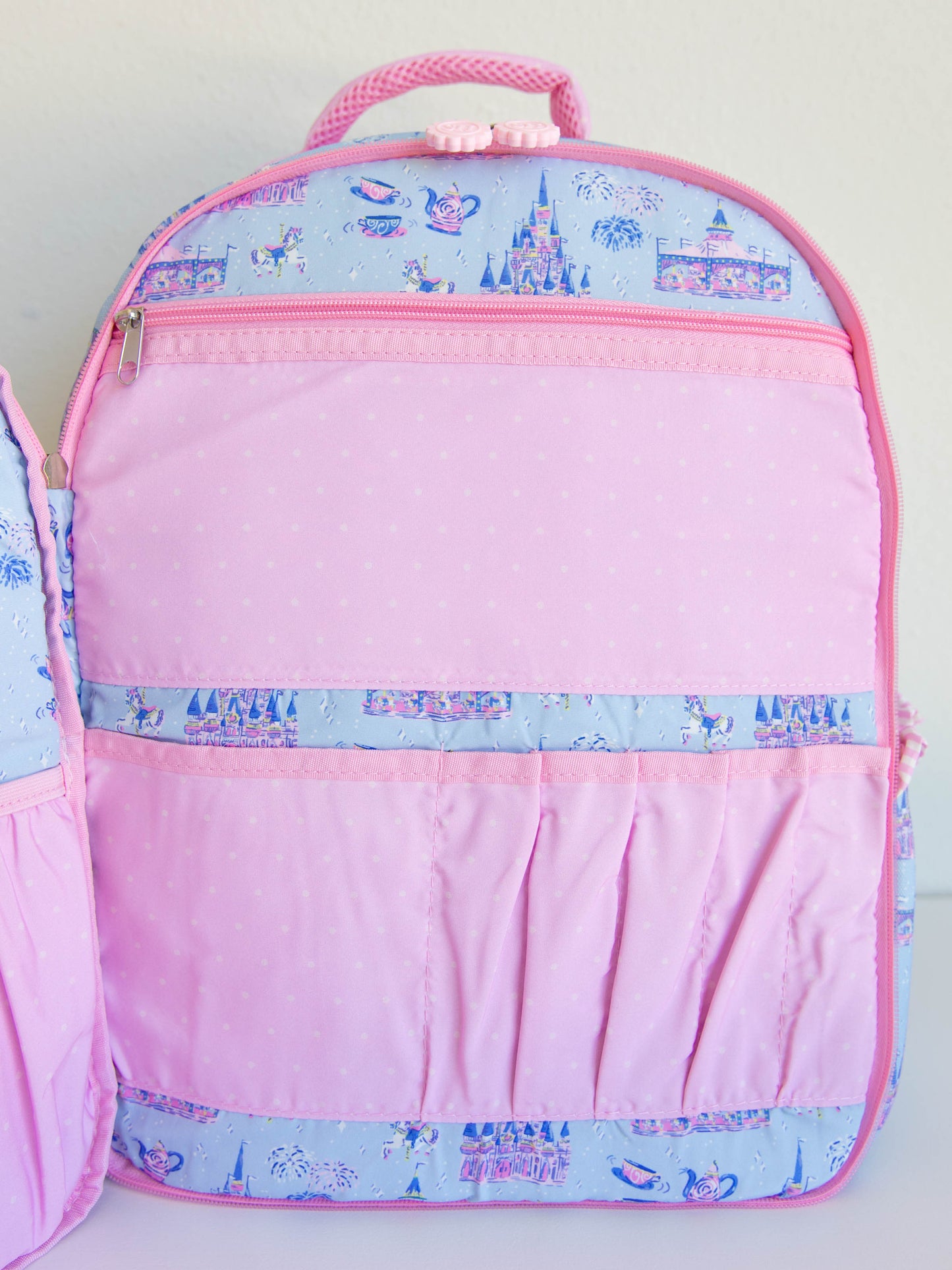 Bring the magic wherever you go with SweetHoney's Most Magical Backpack — a whimsical essential for school days, travel adventures, and every little outing in between! Designed in our signature Most Magical print, this backpack features charming pastel castles, carriages, and fairytale-inspired details that spark imagination and joy. Crafted from durable, easy-to-clean material, it’s built to last through every adventure. 