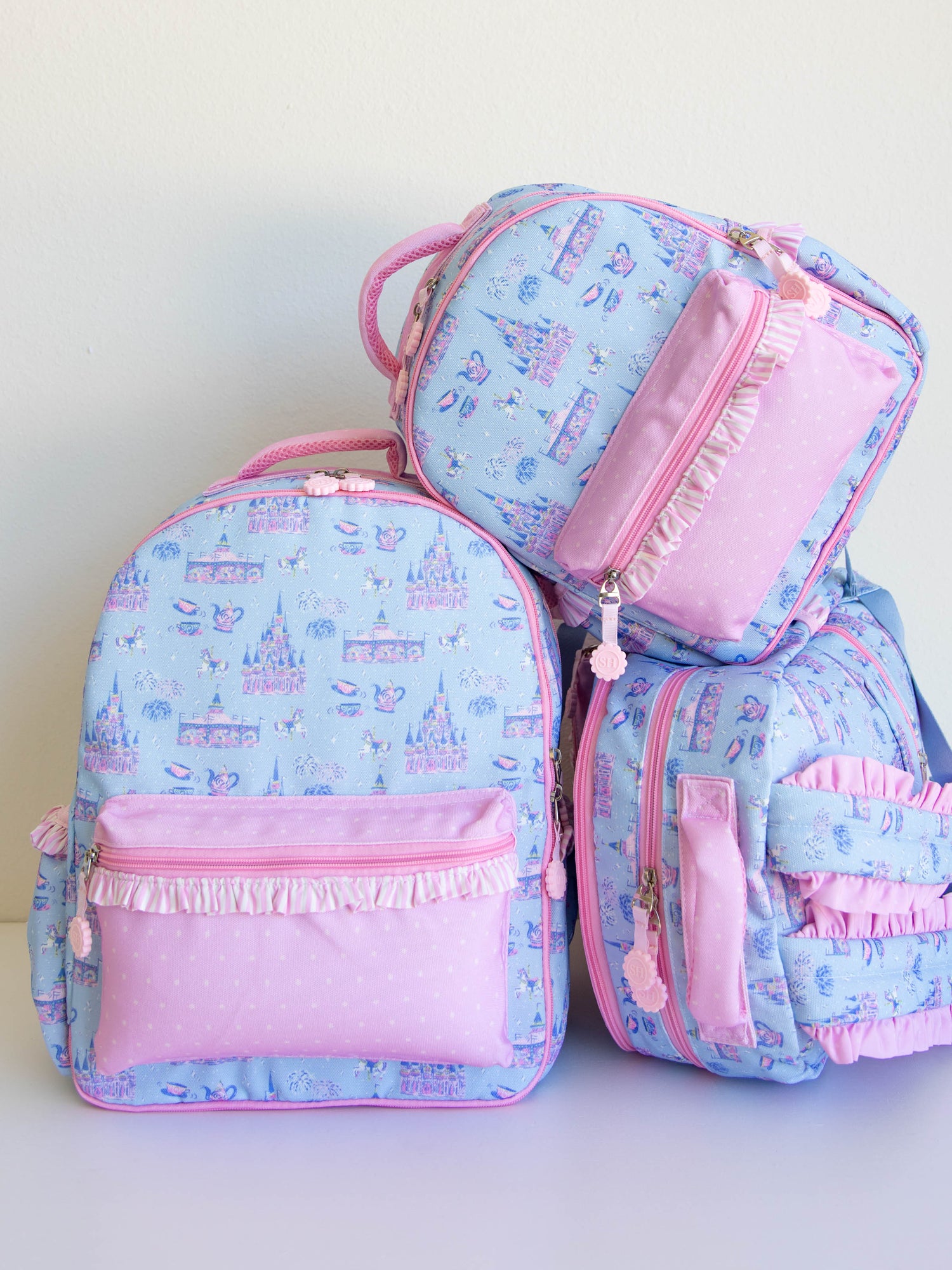 Bring the magic wherever you go with SweetHoney's Most Magical Backpack — a whimsical essential for school days, travel adventures, and every little outing in between! Designed in our signature Most Magical print, this backpack features charming pastel castles, carriages, and fairytale-inspired details that spark imagination and joy. Crafted from durable, easy-to-clean material, it’s built to last through every adventure. 