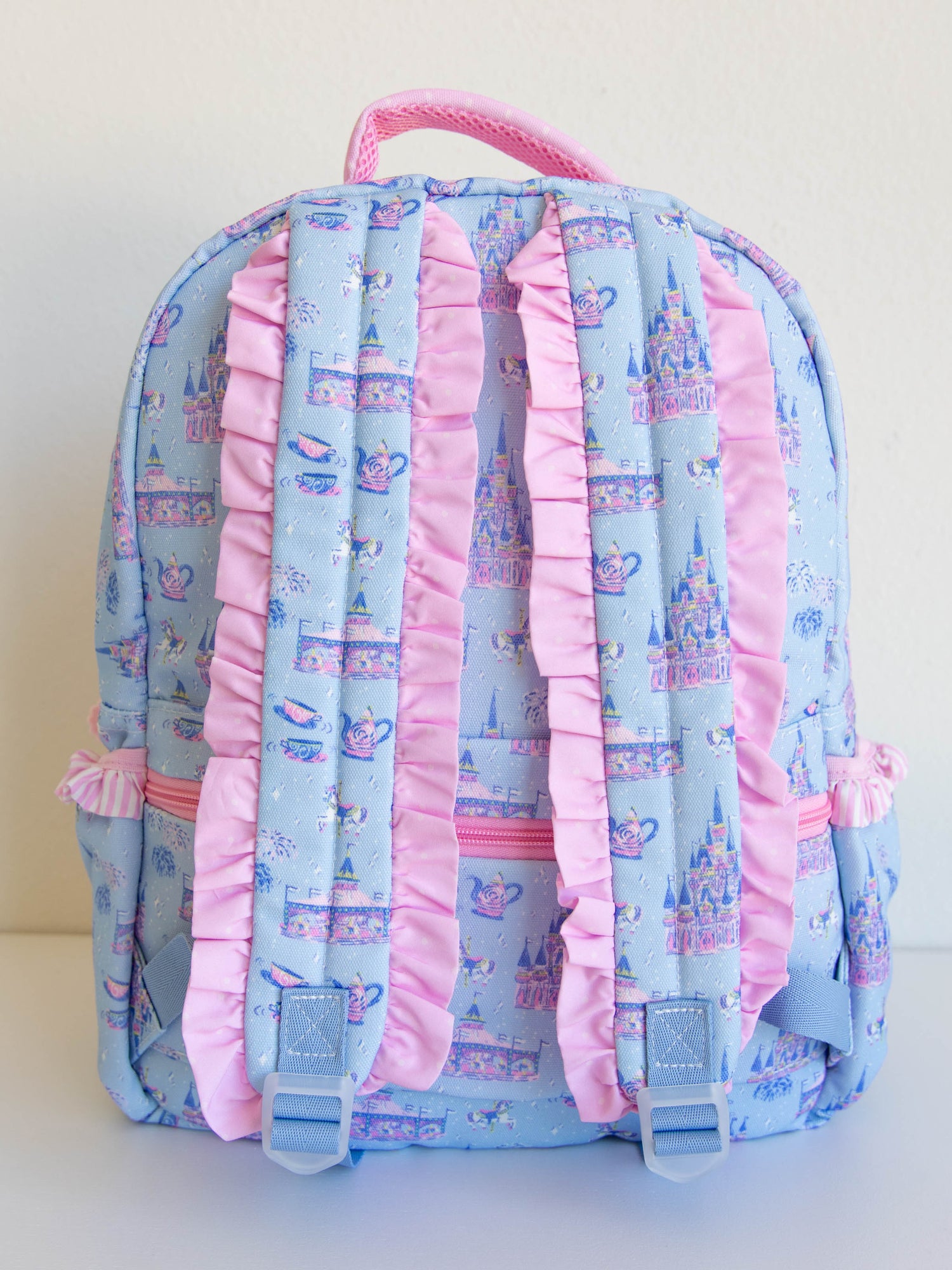Bring the magic wherever you go with SweetHoney's Most Magical Backpack — a whimsical essential for school days, travel adventures, and every little outing in between! Designed in our signature Most Magical print, this backpack features charming pastel castles, carriages, and fairytale-inspired details that spark imagination and joy. Crafted from durable, easy-to-clean material, it’s built to last through every adventure. 