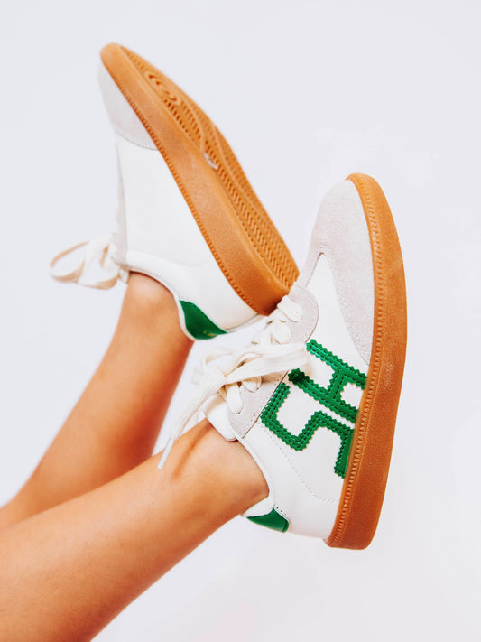 Fresh, fun, and full of SweetHoney style — our Signature Sneakers in green and white are the perfect mix of comfort and charm! Featuring our bold “SH” SweetHoney logo, soft suede accents, and durable gum soles, these boutique kids’ sneakers are designed for everyday adventures. Whether paired with twirl dresses or playtime outfits, they’re the ultimate blend of fashion and function for little trendsetters on the go.