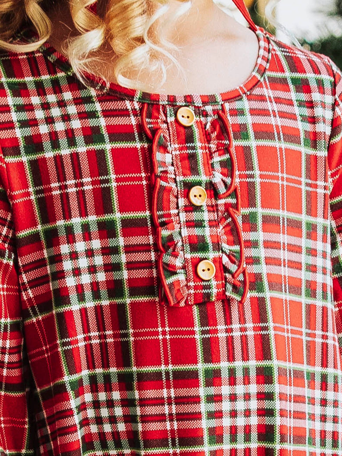 This merry plaid dress for girls features a timeless red, white, and green tartan pattern that’s perfect for the holiday season. Designed with classic charm and sweet details, this girls’ plaid Christmas dress is ideal for family photos, lounge and play. The soft, lightweight fabric ensures all-day comfort, while the twirl-worthy skirt adds a playful touch. A must-have addition to her holiday wardrobe!