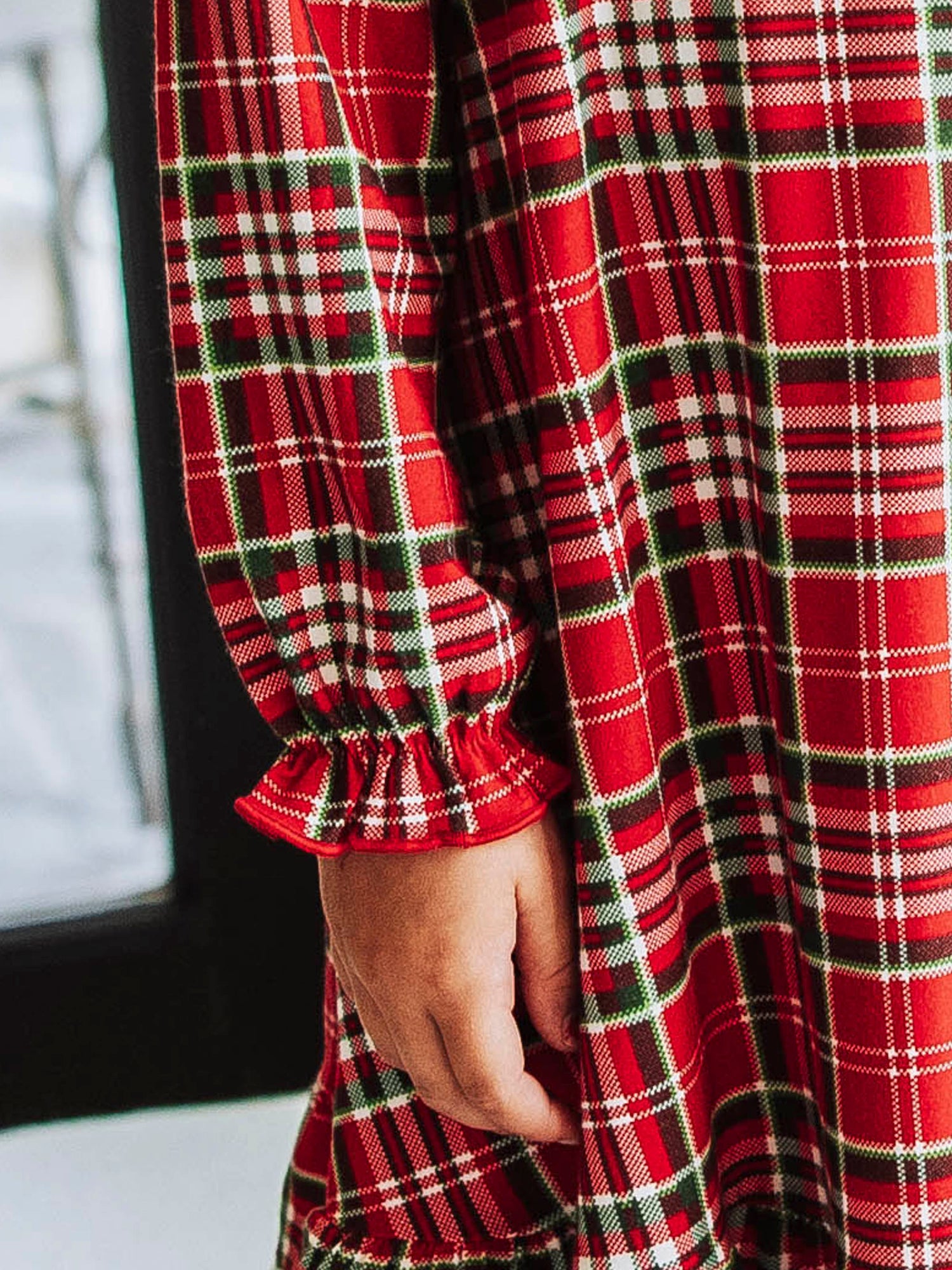 This merry plaid dress for girls features a timeless red, white, and green tartan pattern that’s perfect for the holiday season. Designed with classic charm and sweet details, this girls’ plaid Christmas dress is ideal for family photos, lounge and play. The soft, lightweight fabric ensures all-day comfort, while the twirl-worthy skirt adds a playful touch. A must-have addition to her holiday wardrobe!