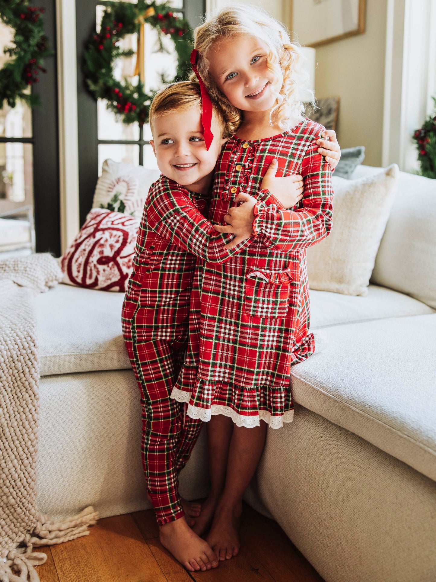 This merry plaid dress for girls features a timeless red, white, and green tartan pattern that’s perfect for the holiday season. Designed with classic charm and sweet details, this girls’ plaid Christmas dress is ideal for family photos, lounge and play. The soft, lightweight fabric ensures all-day comfort, while the twirl-worthy skirt adds a playful touch. A must-have addition to her holiday wardrobe!