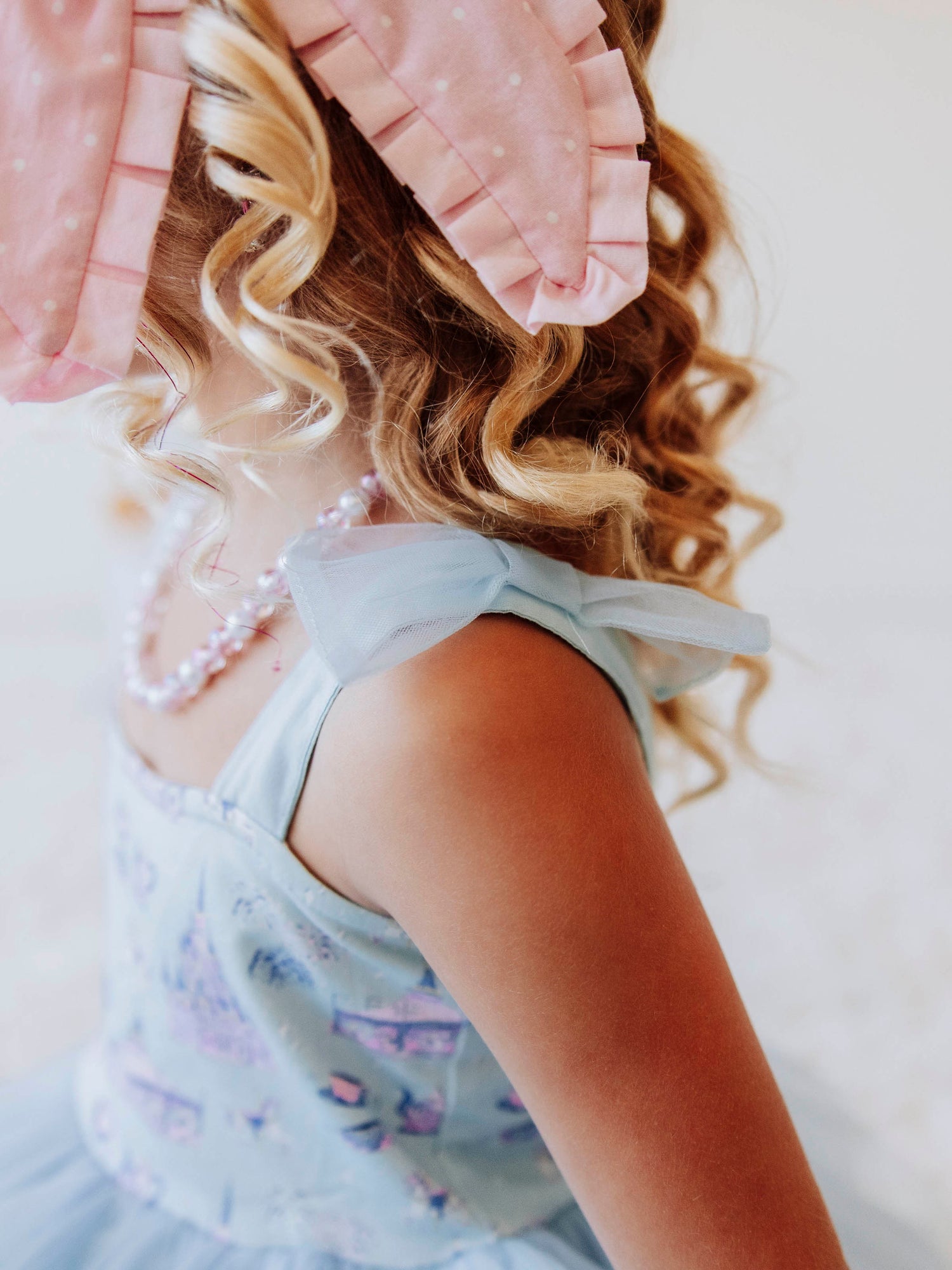 Bring a little fairytale sparkle to her wardrobe with our Most Magical Tulle Dress! Designed for twirls and make-believe moments, this enchanting girls’ dress features our whimsical Most Magical print on a soft, stretchy bodice paired with a full layered tulle skirt for the ultimate princess look. Perfect for birthdays, special occasions, or everyday play, it comfort and charm. Finished with delicate straps and a flowy silhouette, this dress makes every girl feel like she’s stepped into a fairytale!