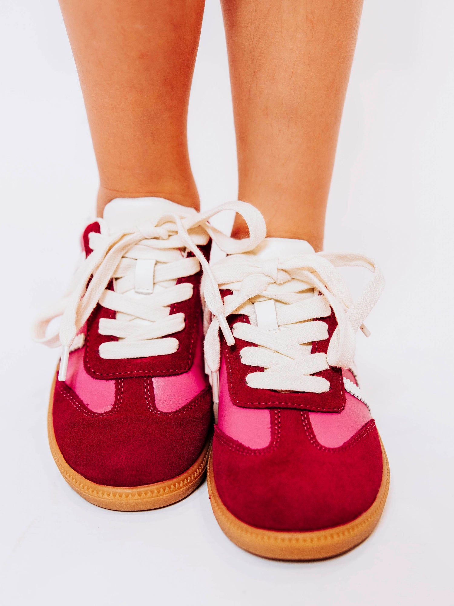 Step into style with our SweetHoney Signature Sneakers! Designed for comfort and play, these adorable girls’ sneakers feature a fun mix of pink and red tones with our signature “SH” SweetHoney logo for a bold, playful touch. Crafted with soft materials, sturdy soles, and easy lace-up styling, they’re perfect for school days, adventures, and everyday wear. Combining fashion and function, these sneakers are a must-have for every little trendsetter!
