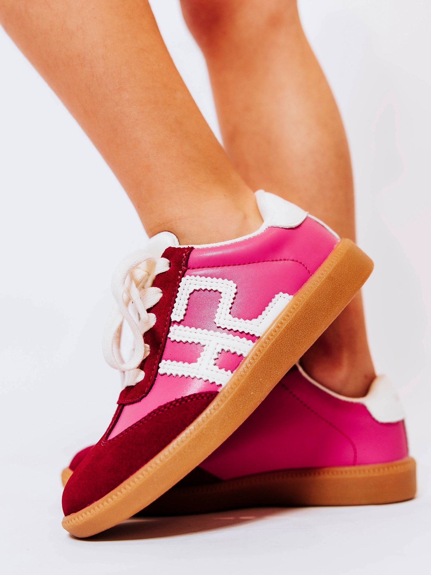 Step into style with our SweetHoney Signature Sneakers! Designed for comfort and play, these adorable girls’ sneakers feature a fun mix of pink and magenta tones with our signature “SH” SweetHoney logo for a bold, playful touch. Crafted with soft materials, sturdy soles, and easy lace-up styling, they’re perfect for school days, adventures, and everyday wear. Combining fashion and function, these sneakers are a must-have for every little trendsetter!