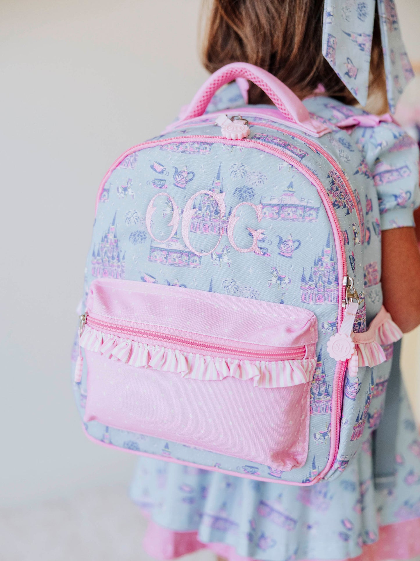 Bring the magic wherever you go with SweetHoney's Most Magical Backpack — a whimsical essential for school days, travel adventures, and every little outing in between! Designed in our signature Most Magical print, this backpack features charming pastel castles, carriages, and fairytale-inspired details that spark imagination and joy. Crafted from durable, easy-to-clean material, it’s built to last through every adventure. 