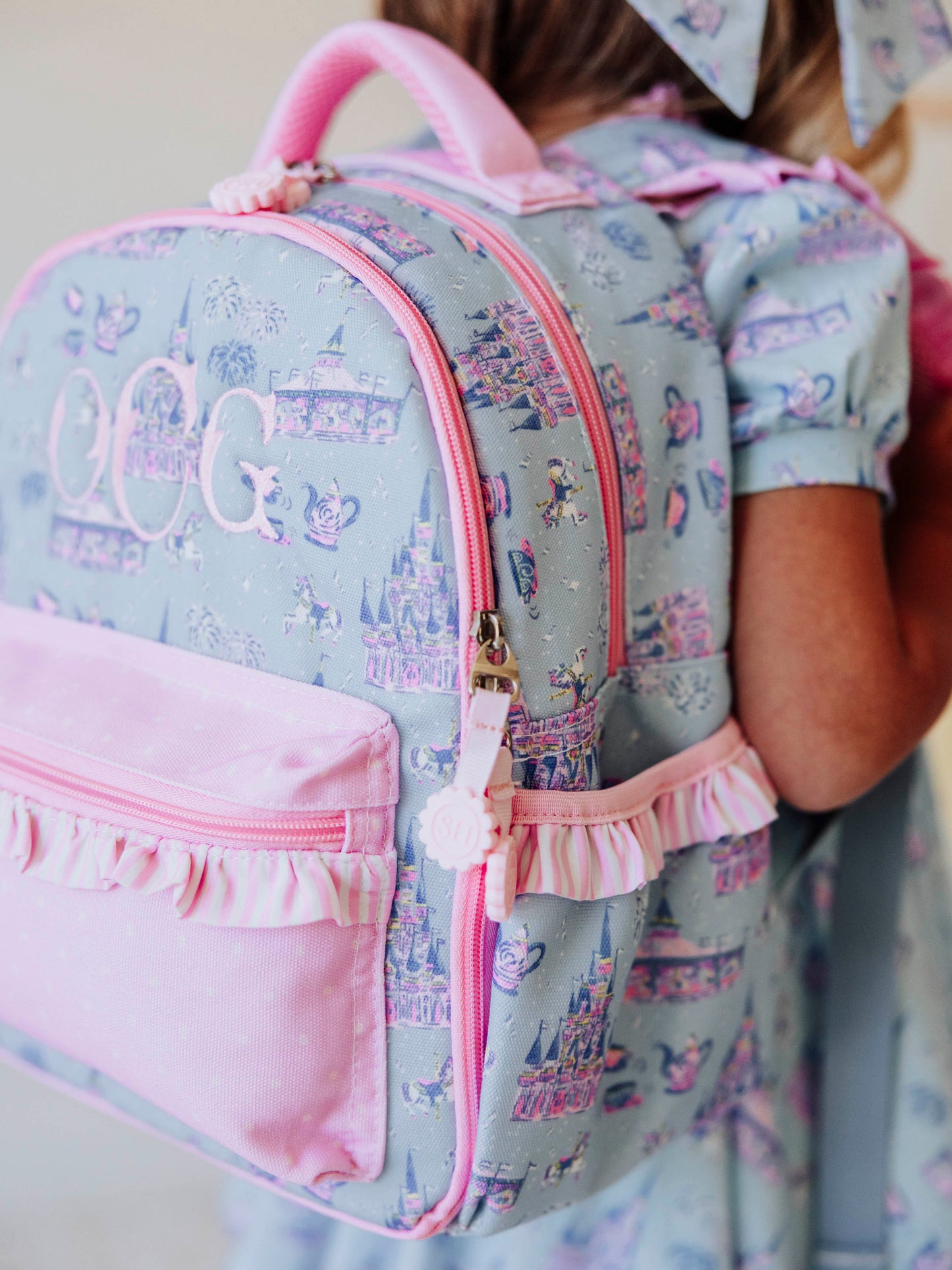Bring the magic wherever you go with SweetHoney's Most Magical Backpack — a whimsical essential for school days, travel adventures, and every little outing in between! Designed in our signature Most Magical print, this backpack features charming pastel castles, carriages, and fairytale-inspired details that spark imagination and joy. Crafted from durable, easy-to-clean material, it’s built to last through every adventure. 