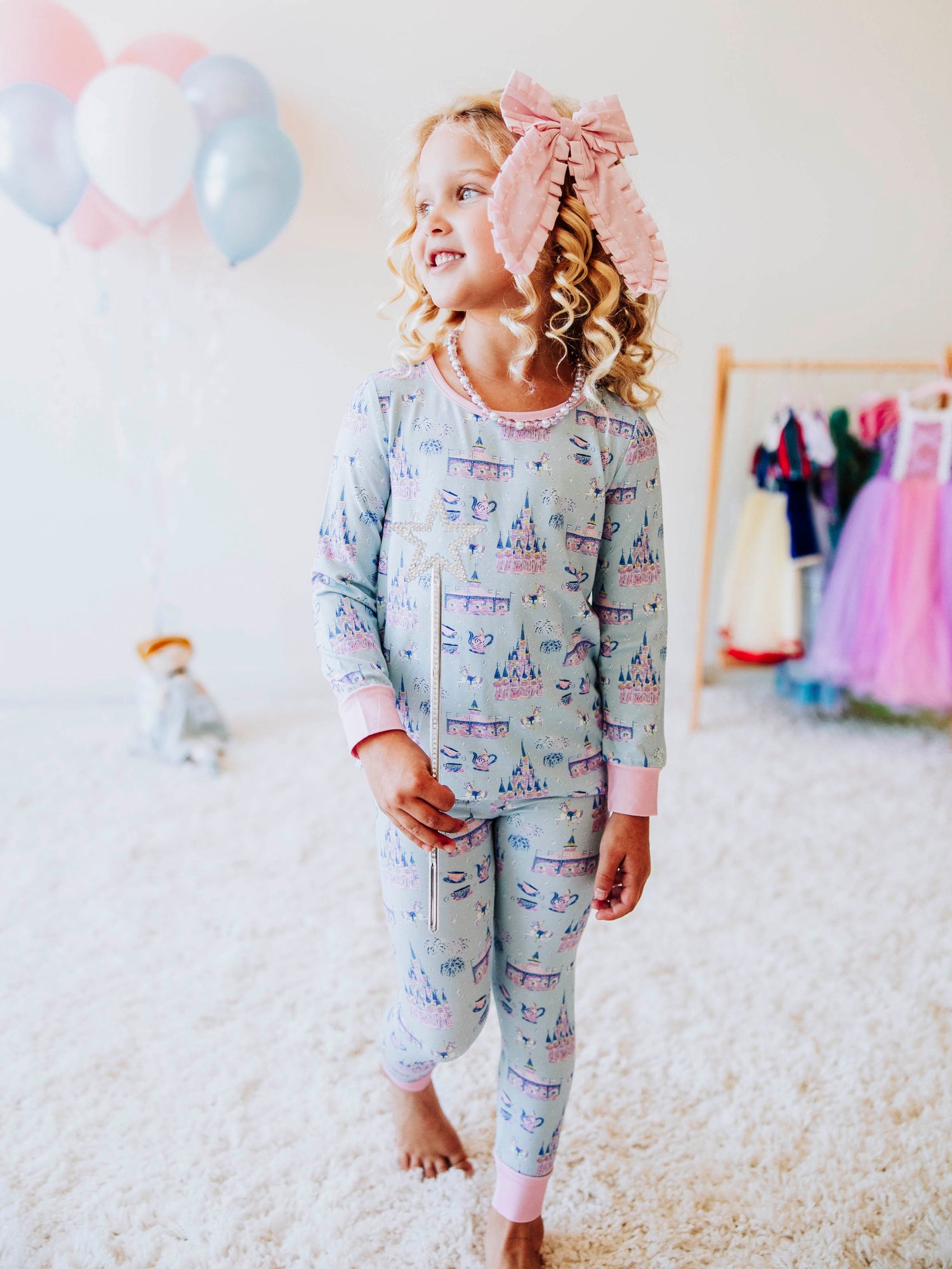 Drift off to dreamland in our “Most Magical” fitted two-piece pajamas, featuring a whimsical print filled with sparkling castles, carousels, and fairy-tale fun. Made from ultra-soft, stretchy fabric, these girls’ pajamas are designed for cozy comfort and a snug fit that stays put all night long. Perfect for little dreamers who love all things magical, these cotton-blend PJs make bedtime feel like a fairytale adventure.
