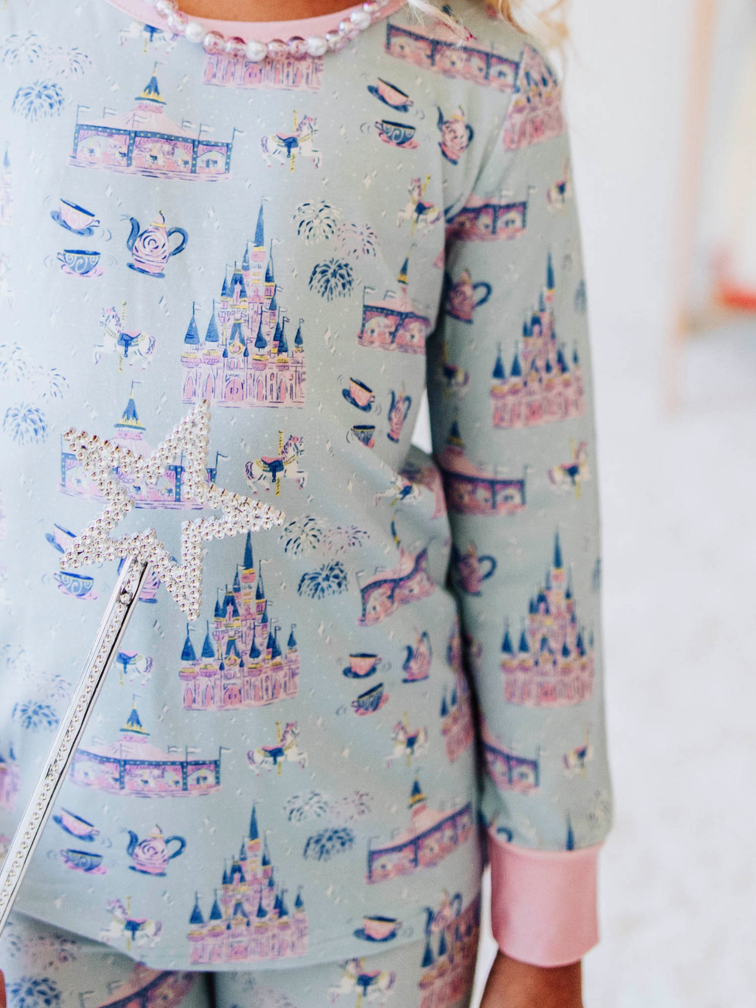 Drift off to dreamland in our “Most Magical” fitted two-piece pajamas, featuring a whimsical print filled with sparkling castles, carousels, and fairy-tale fun. Made from ultra-soft, stretchy fabric, these girls’ pajamas are designed for cozy comfort and a snug fit that stays put all night long. Perfect for little dreamers who love all things magical, these cotton-blend PJs make bedtime feel like a fairytale adventure.