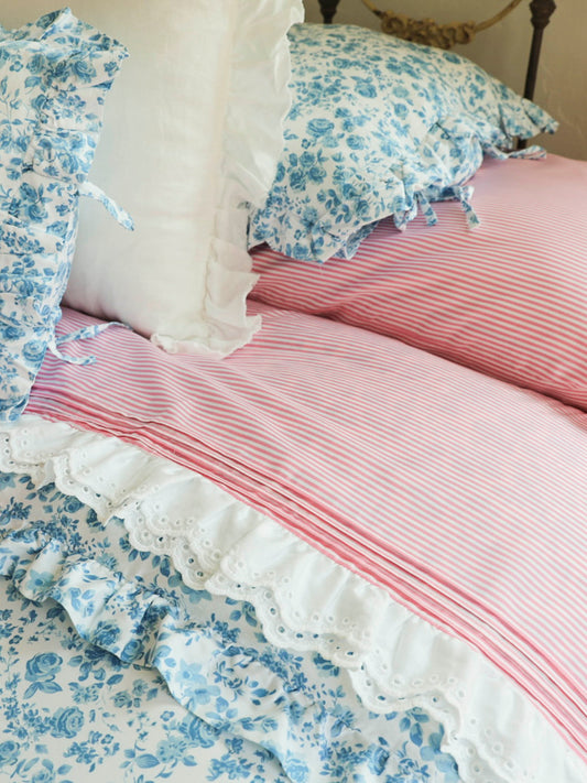 Elevate your bedding with our elegant lace-trimmed sheet set, designed to bring timeless charm and refined detail to any bedroom. Crafted from soft, breathable fabric, these sheets feature a delicate eyelet lace ruffle along the edge for a romantic, heirloom-inspired finish. The scalloped lace trim adds texture and dimension, while the subtle pintuck detailing enhances the overall craftsmanship. Perfect for creating a light, airy, and feminine look, this lace accent transforms a simple sheet into a standout