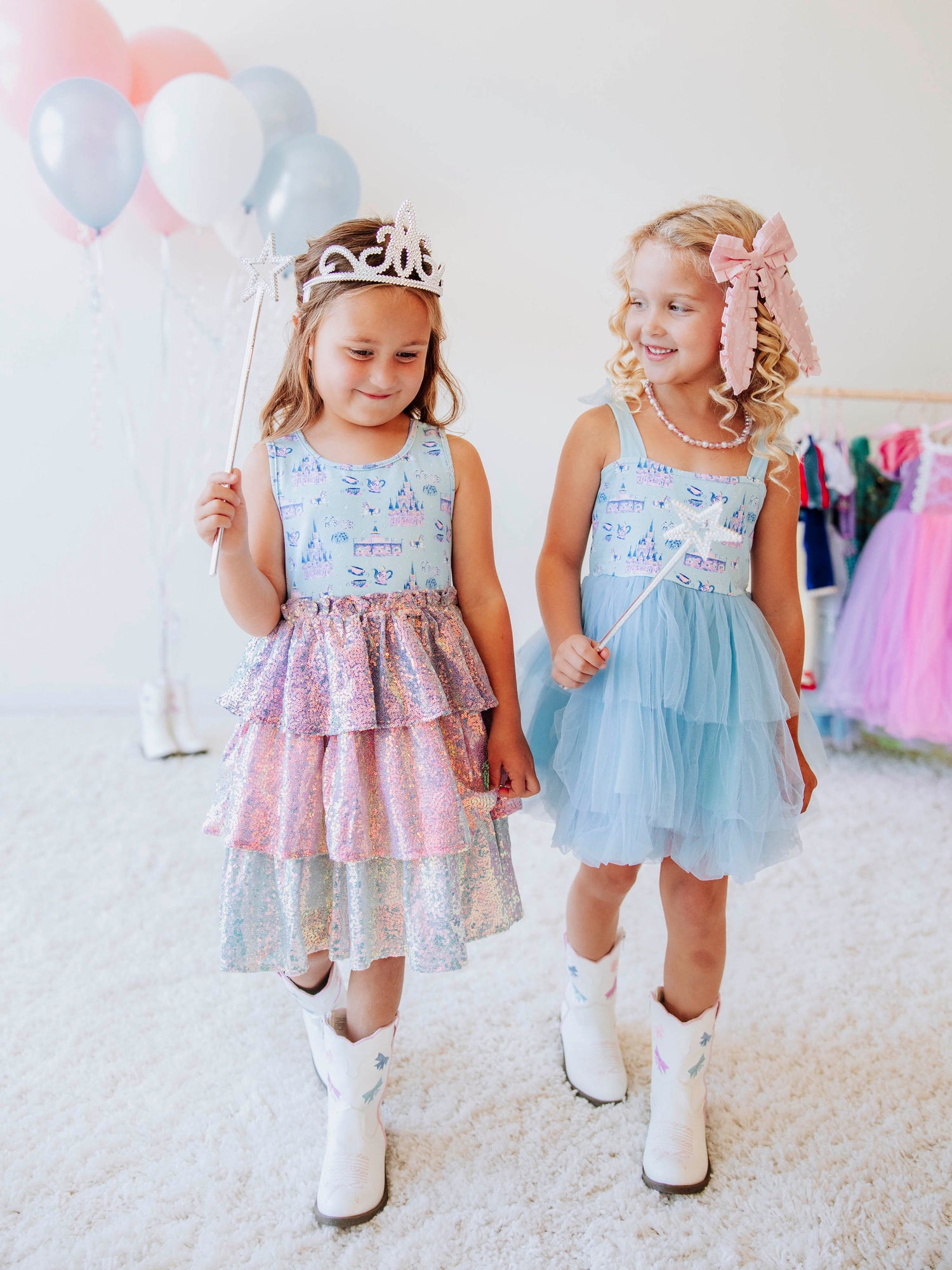 Bring a little fairytale sparkle to her wardrobe with our Most Magical Tulle Dress! Designed for twirls and make-believe moments, this enchanting girls’ dress features our whimsical Most Magical print on a soft, stretchy bodice paired with a full layered tulle skirt for the ultimate princess look. Perfect for birthdays, special occasions, or everyday play, it comfort and charm. Finished with delicate straps and a flowy silhouette, this dress makes every girl feel like she’s stepped into a fairytale!