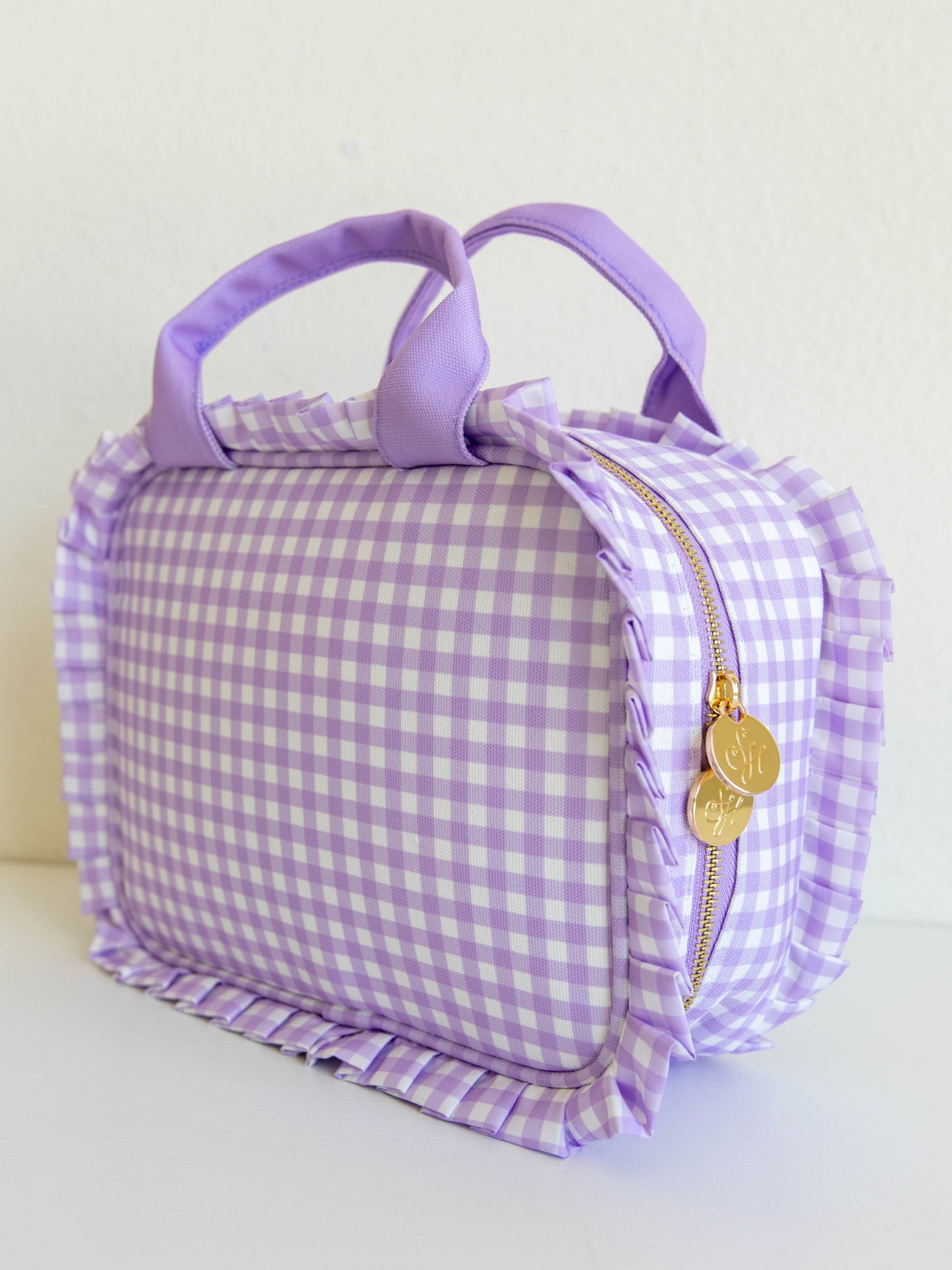 Purple check lunch kit with purple handles and ruffled edge details.