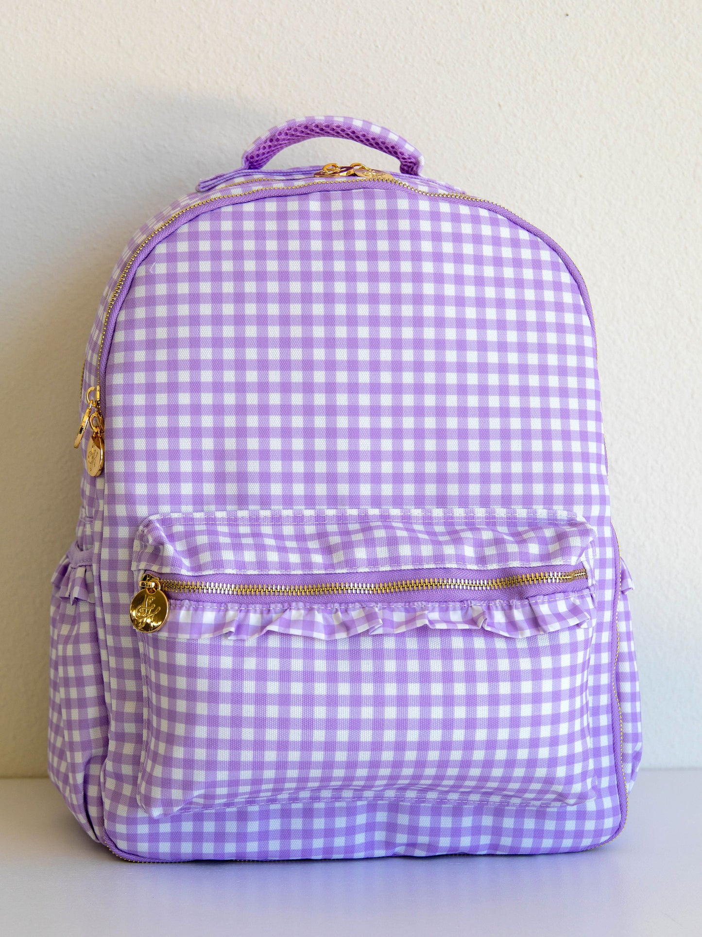 Single purple gingham backpack