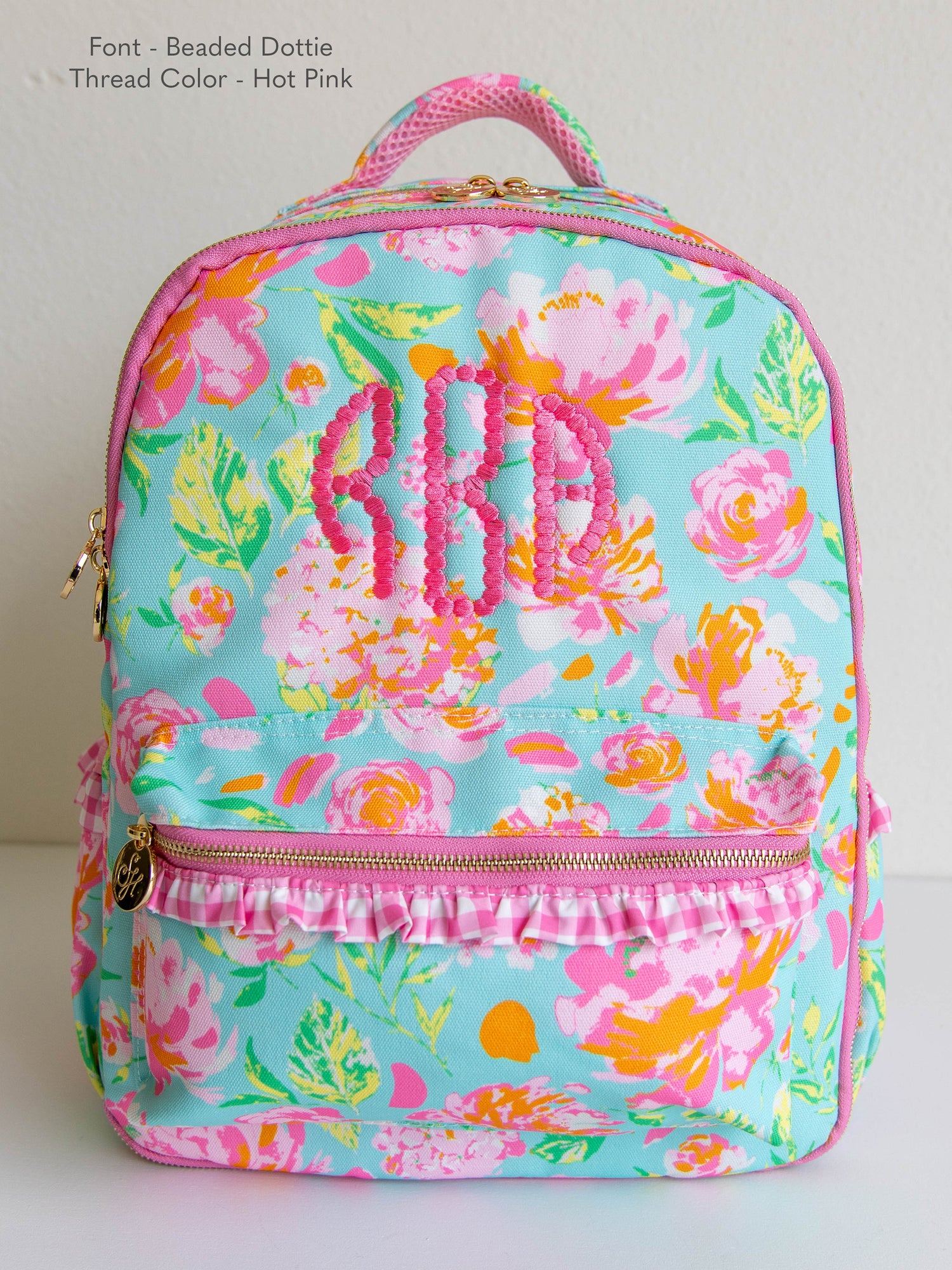 Floral and colorful backpack with embroidery customization in pink