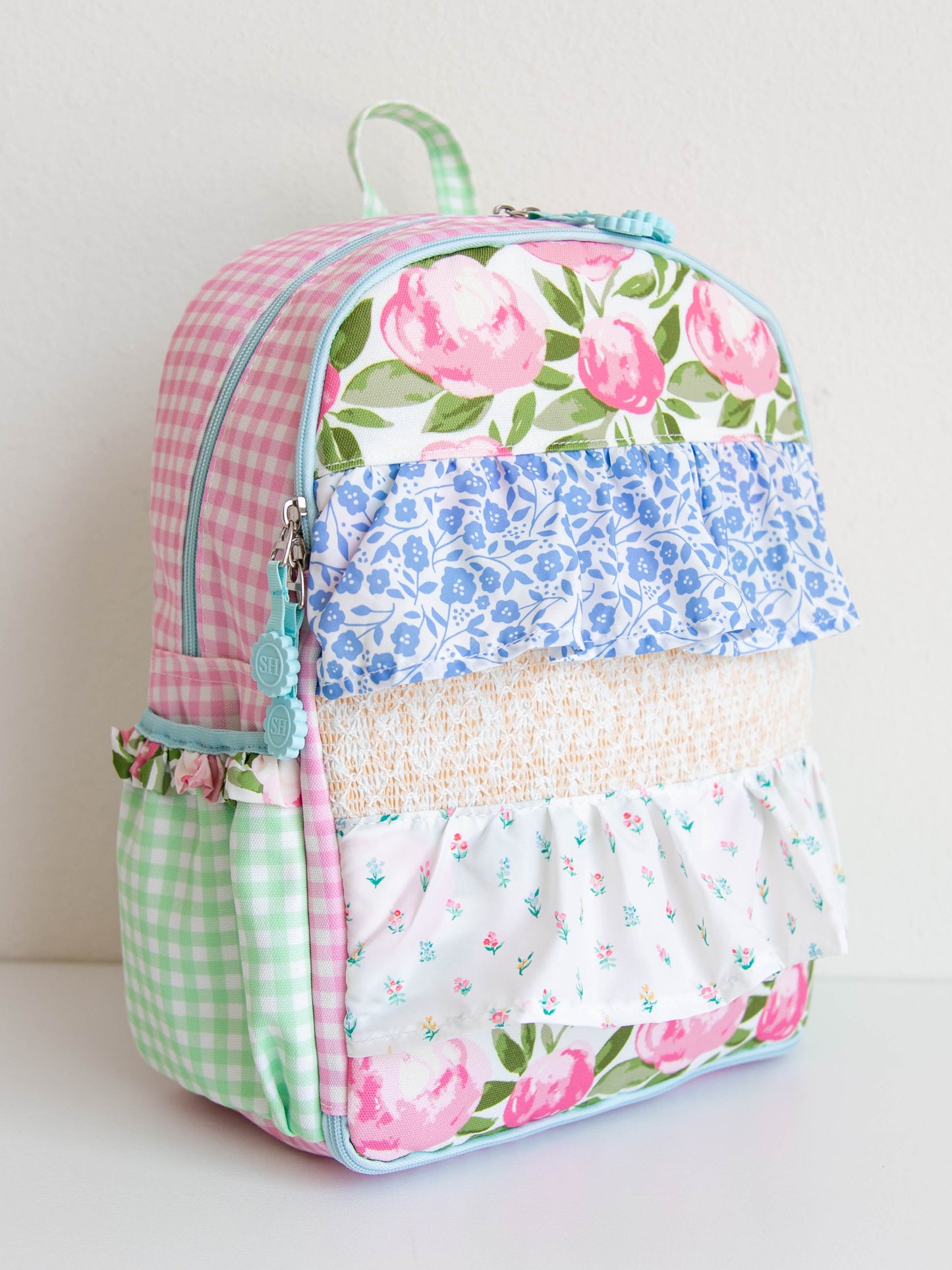 Backpack with floral and colorful designs