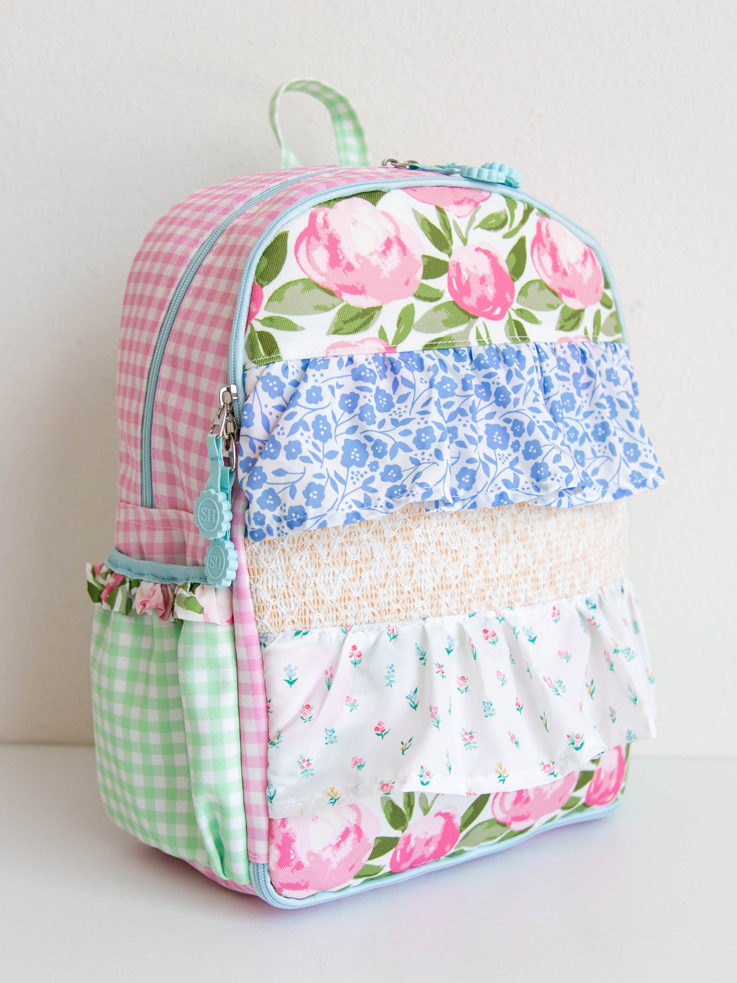 Backpack with floral and colorful designs