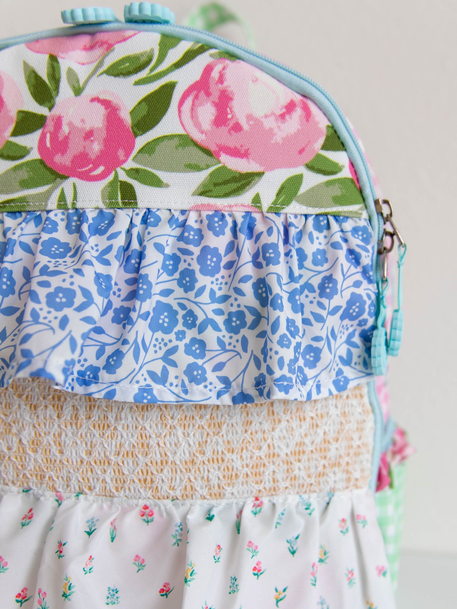 Backpack with floral and colorful designs
