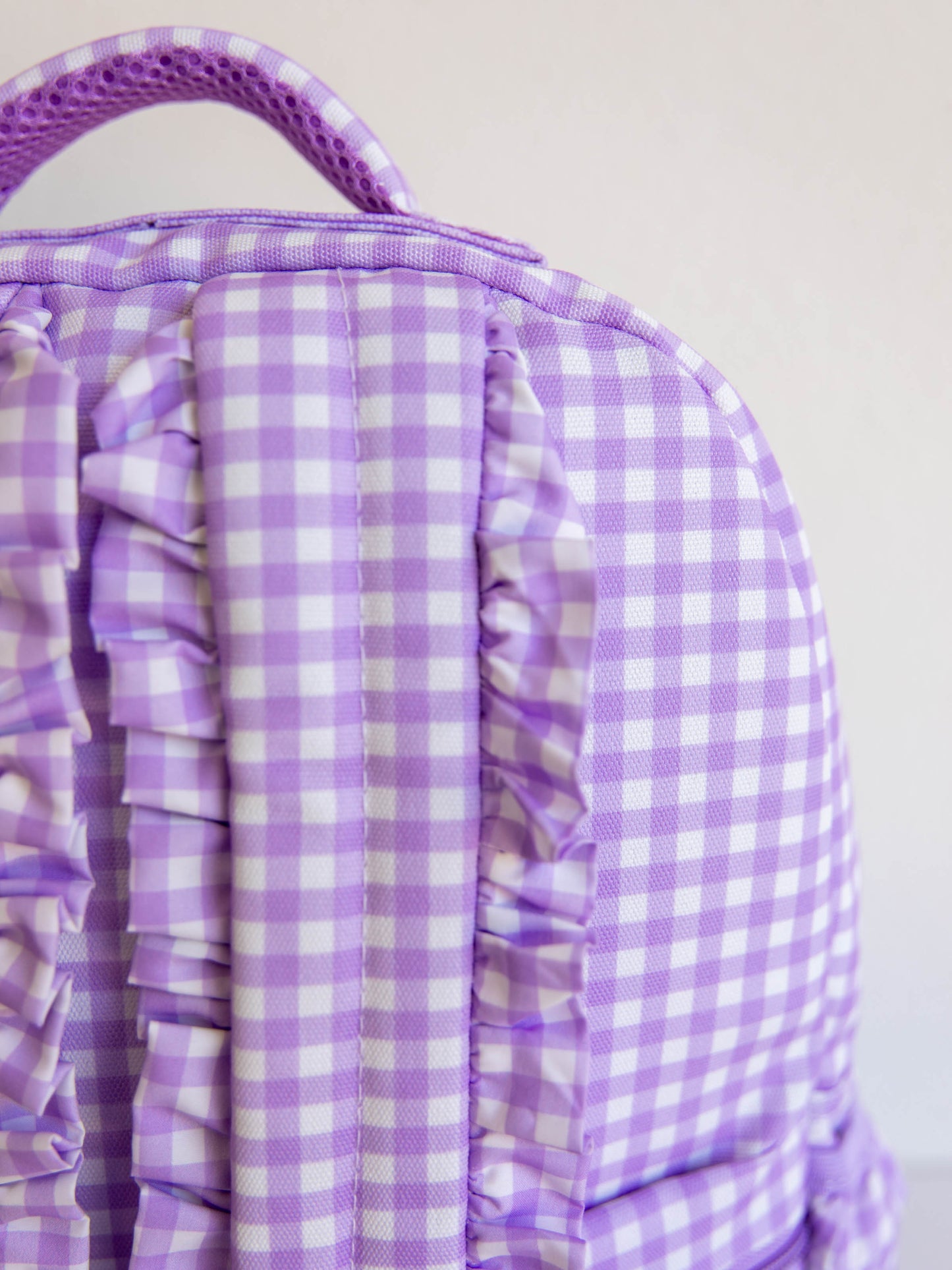 Purple gingham backpack ruffled strap