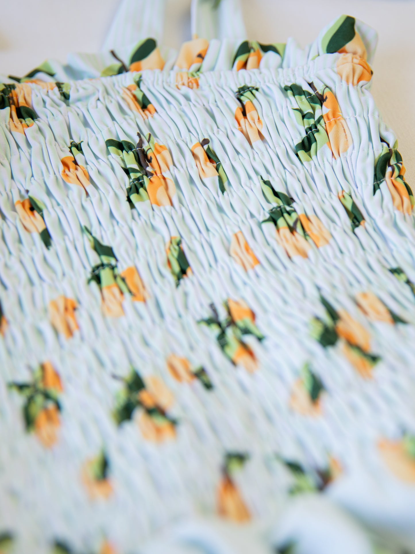 Smocked One Piece - Oranges Stripe