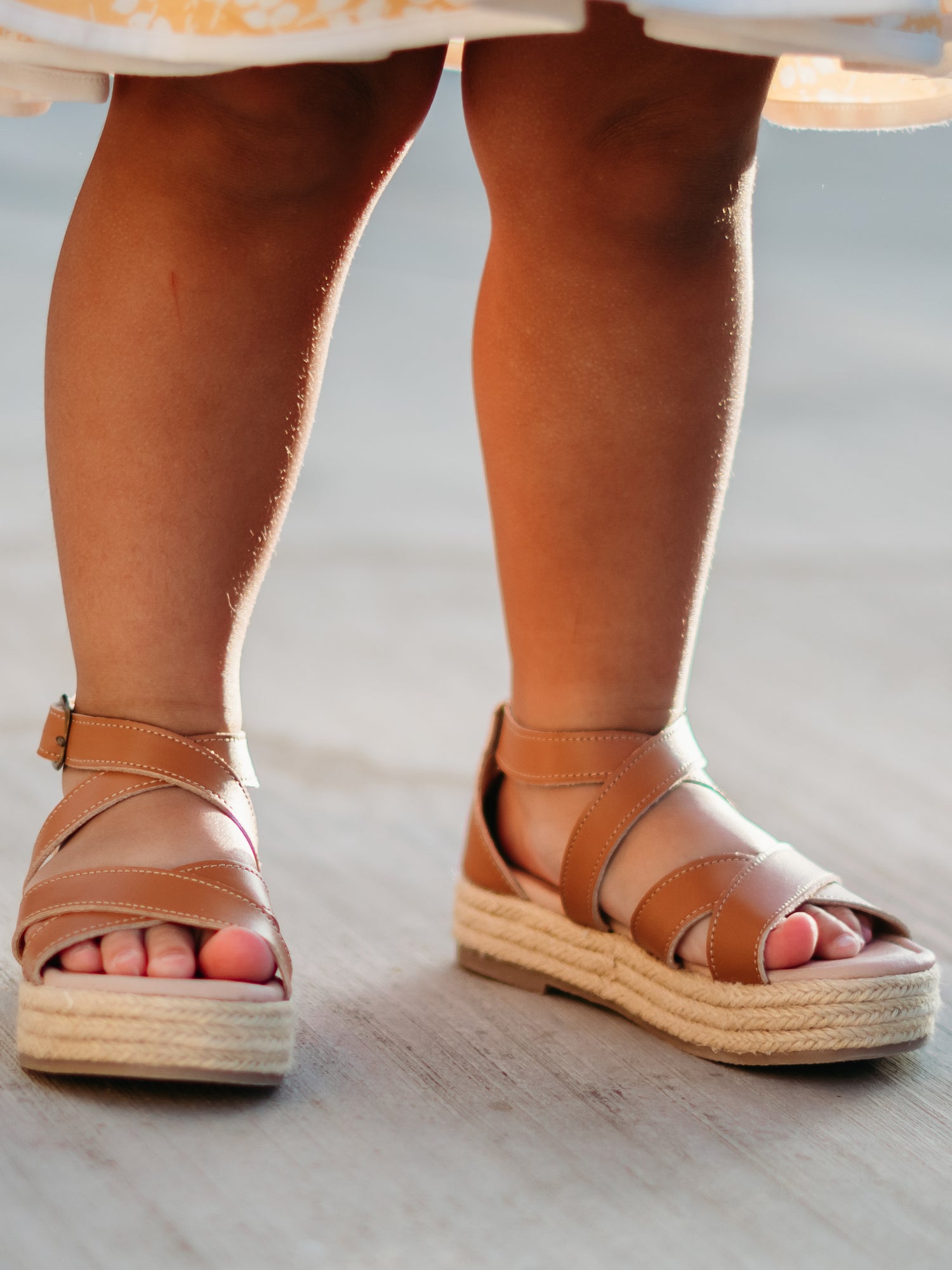 Closeup of a girl showing off her new sandals