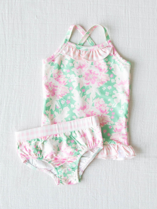 Cami Lounger Set – Blooms for Days. It comes in a pattern of light pink flowers and leaves on a light green background.