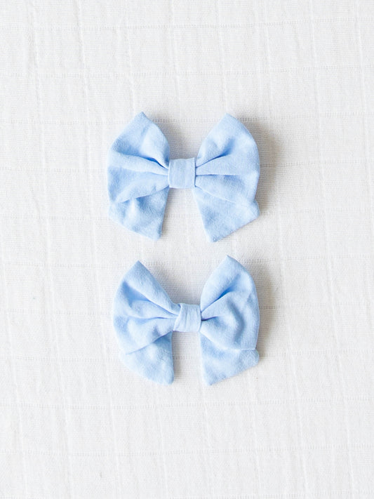 This Bow Set Duo - Blue Dorothy comes in a lovely light blue color.