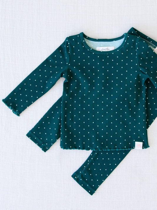 Frilled Sleeve Set - Christmas Dotty. This long sleeve set comes in a pattern of white polka dots on a deep blue green background.