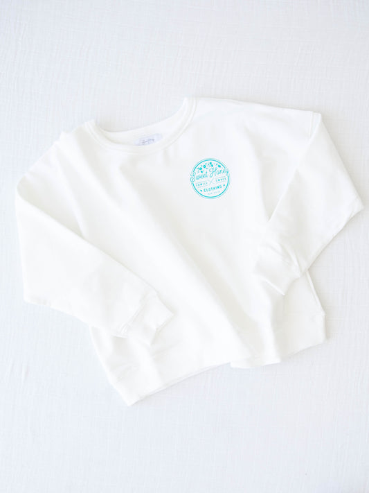 Sporty Crewneck comes in an almost white color with a with the SweetHoney logo in turquoise. 