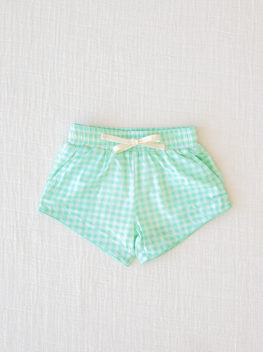 European cut style of our Boy's Everyday Lined Trunks – Green Check