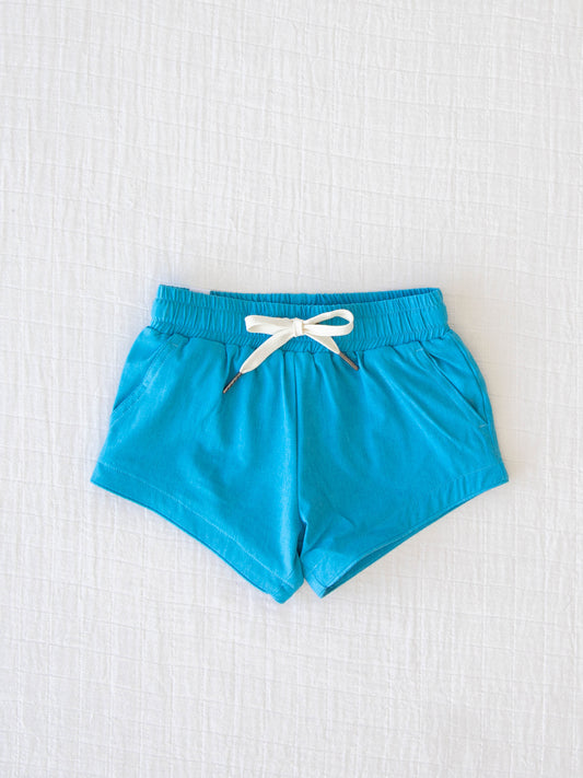 European cut style of our Boy's Everyday Lined Trunks – Aqua Blue Solid. 