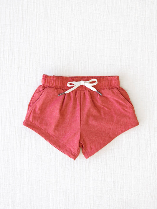European cut style of our Boy's Everyday Lined Trunks – Muted Red Solid
